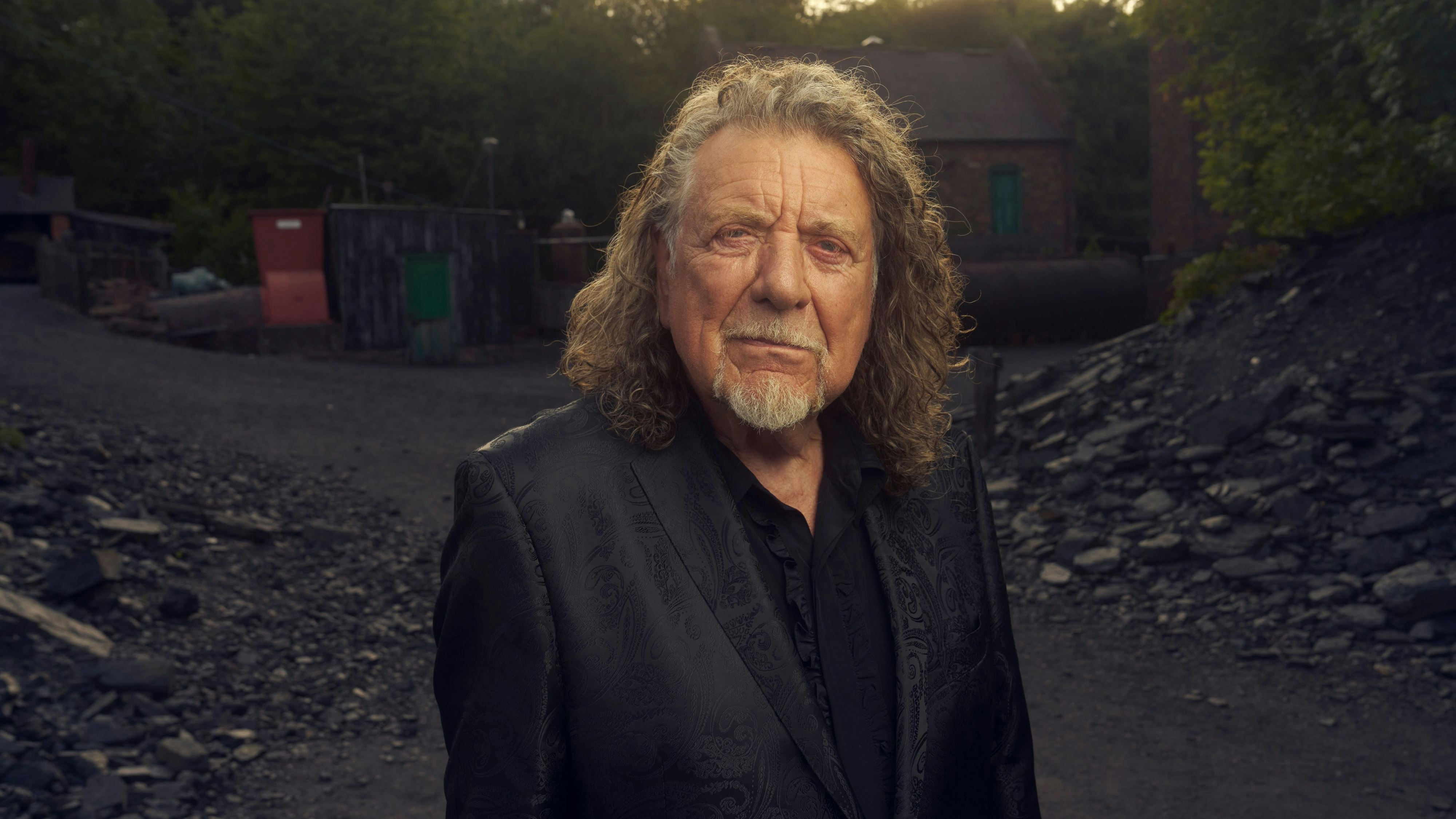 Robert Plant of Saving Grace, photographed by Tom Oldham at the Black Country Living Museum, June 2025.  Saving Grace are:  Robert Plant, vocals Suzi Dian (vocals, accordion) Oli Jefferson (drums & percussion, vocals) Tony Kelsey (acoustic guitar, electric baritone guitar, electric guitar, vocals) Matt Worley (acoustic guitar, steel banjo, nylon string banjo, cuatro, vocals) Barney Morse-Brown (cello)