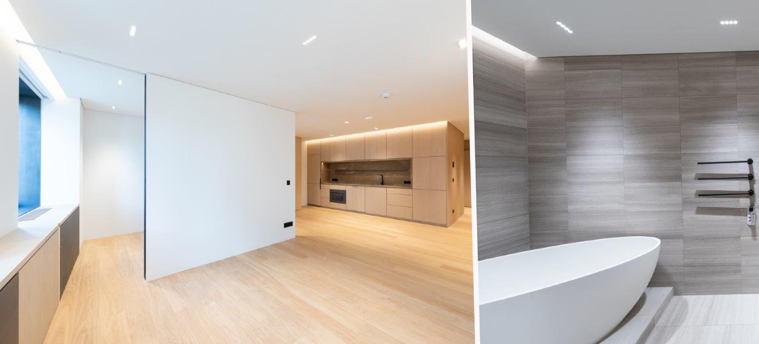 Links: Offene Designer-Küche mit Maßmöbeln – rechts: Spa-Bad mit Wanne und Walk-in-Dusche in der 6.300-Euro-Wohnung.