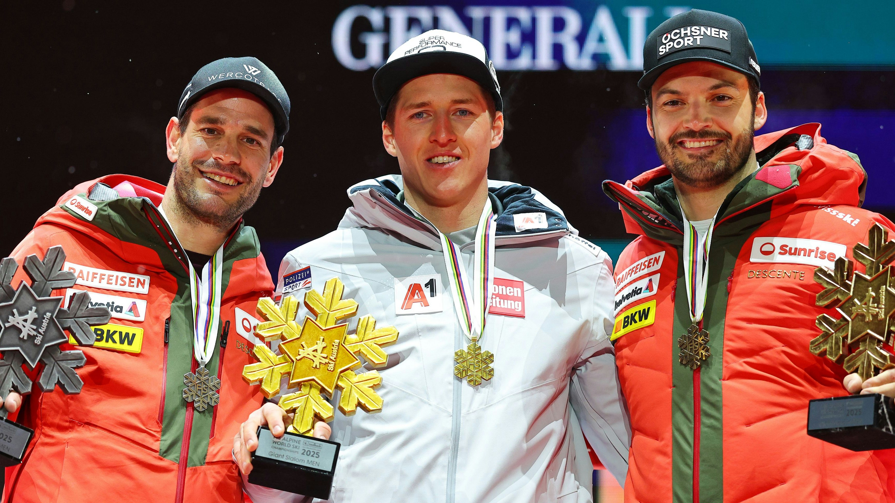 SAALBACH,AUSTRIA,14.FEB.25 - ALPINE SKIING - FIS Alpine World Ski Championships Saalbach 2025, giant slalom, men, medal plaza, award ceremony. Image shows Thomas Tumler (SUI), Raphael Haaser (AUT) and Loic Meillard (SUI). Keywords: medal. Photo: GEPA pictures/ Thomas Bachun