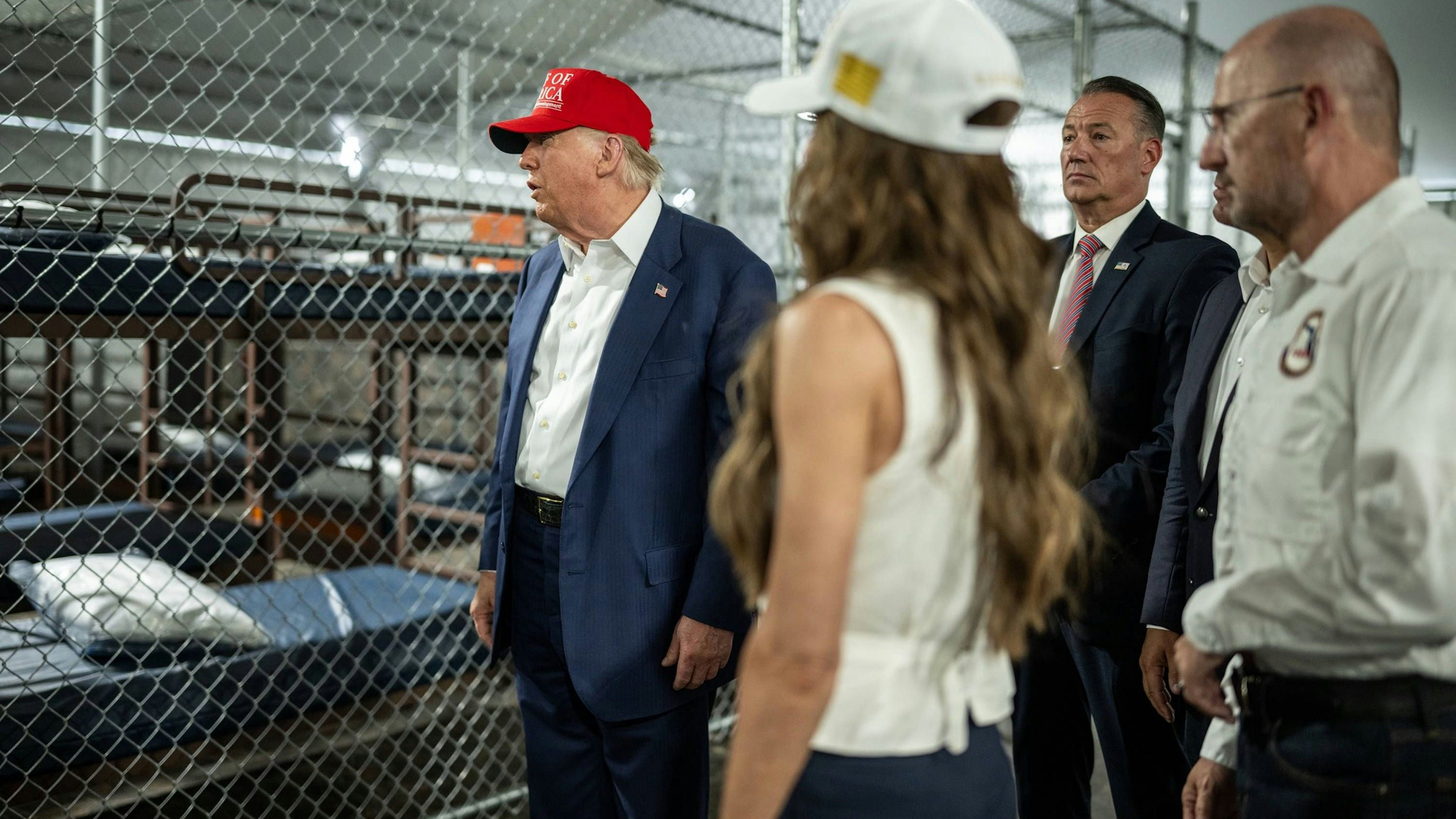July 1, 2025, Ochopee, Florida, USA: President DONALD TRUMP, left, with Secretary of Homeland Security KRISTI NOEM and others, participates in a walking tour of the immigration detention center nicknamed Alligator Alcatraz Tuesday. Ochopee USA - ZUMA 20250701_new_z03_031 Copyright: xWhitexHousex