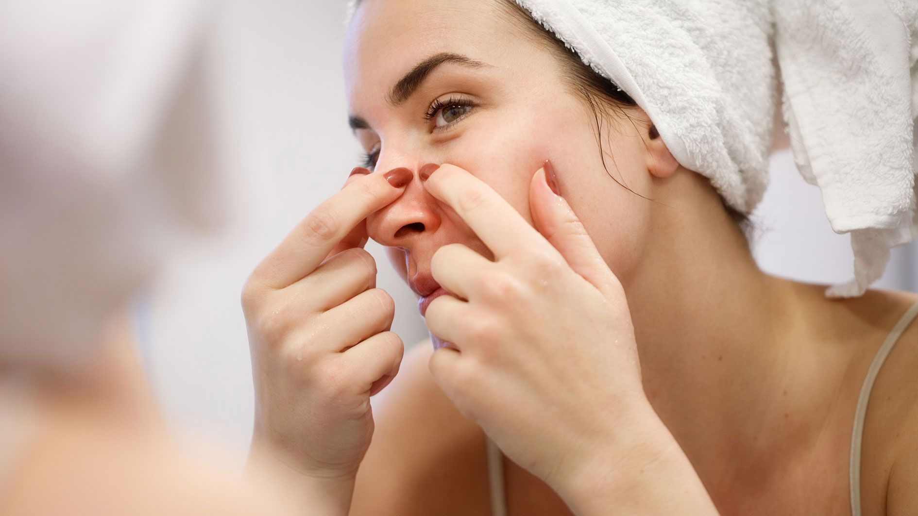 Wird ein Pickel ausgedrückt, könnte sich dieser entzünden.