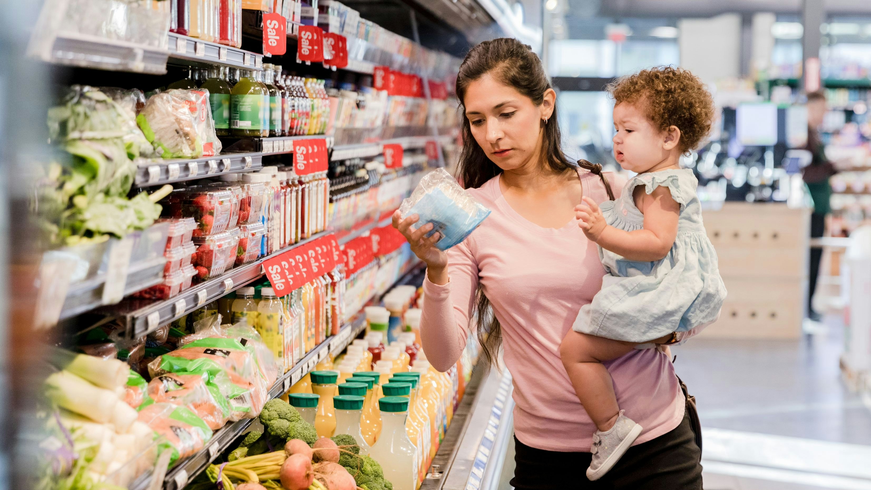 Mutter im Supermarkt