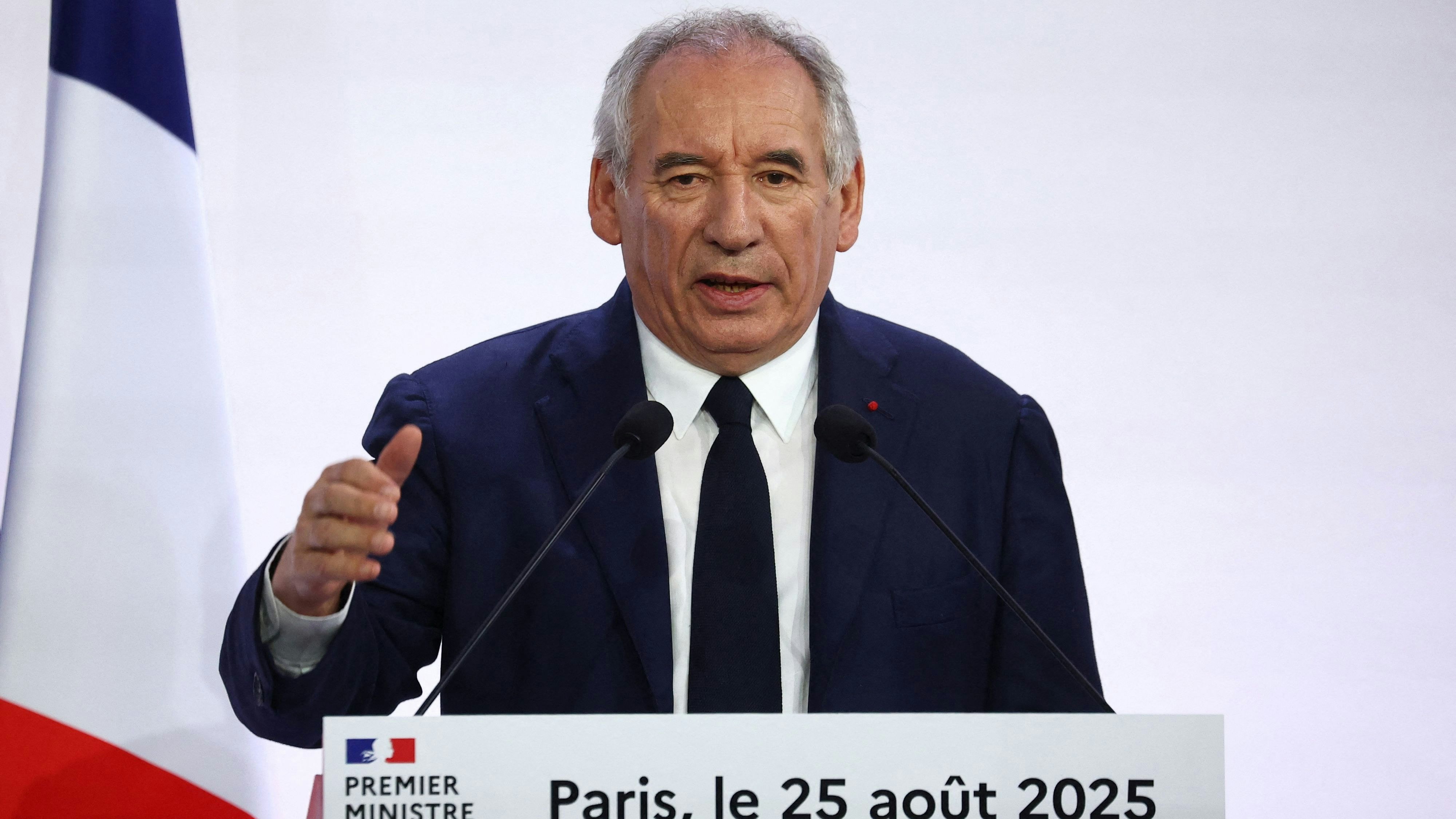 French Prime Minister Francois Bayrou gestures as he delivers a speech during a press conference about his 2026 budget in Paris, France, August 25, 2025. REUTERS/Abdul Saboor 