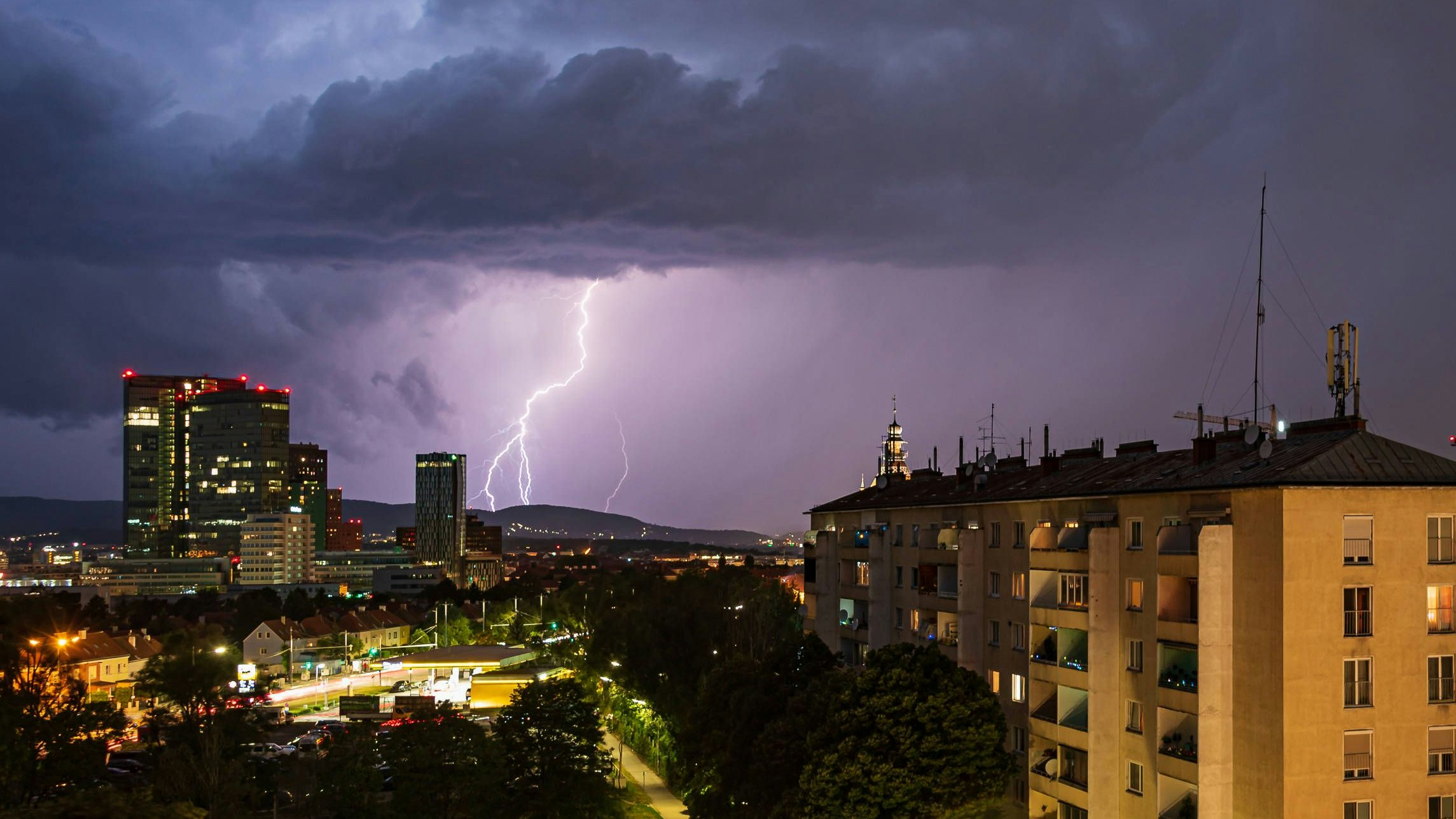 Thunderstorm over the South of Vienna, Austria , 32961582.jpg, Bright, Dark, Lightning, Natural Phenomenon, Nature, Rain, Vienna, background, bolt, buildings, cloud, danger, energy, flash, light, night, power, powerful, sky, spectacular, storm, stormy, strike, striking, summer, thunder, thunderstorm, weather, construction cranes RECORD DATE NOT STATED