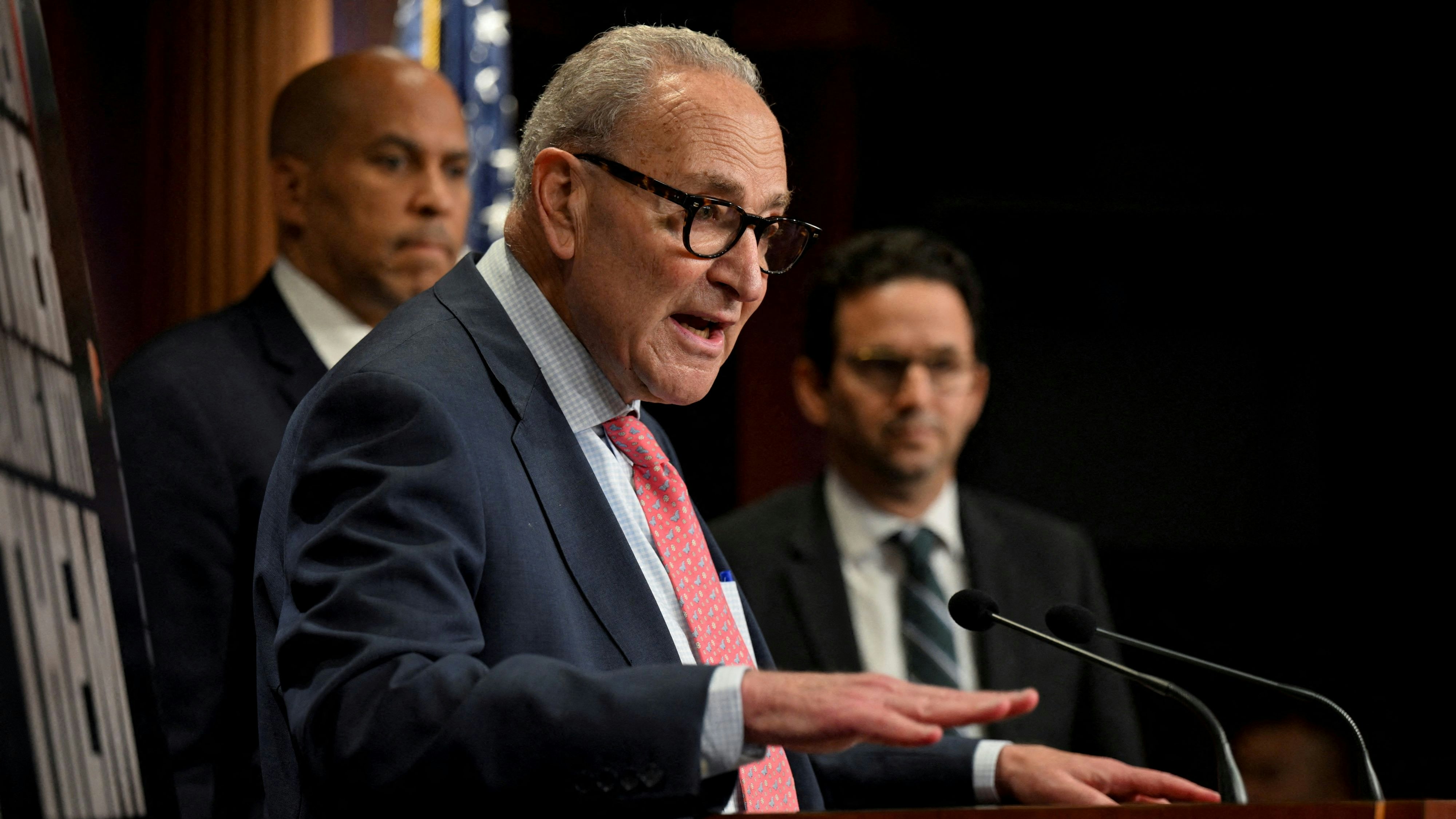 FILE PHOTO: U.S. Senate Minority Leader Chuck Schumer (D-NY) accompanied by other Democratic Senators holds a press conference following a vote in the U.S. Senate on a stopgap spending bill to avert a partial government shutdown that would otherwise begin on October 1, on Capitol Hill in Washington, D.C. U.S., September 19, 2025. REUTERS/Annabelle Gordon/File Photo