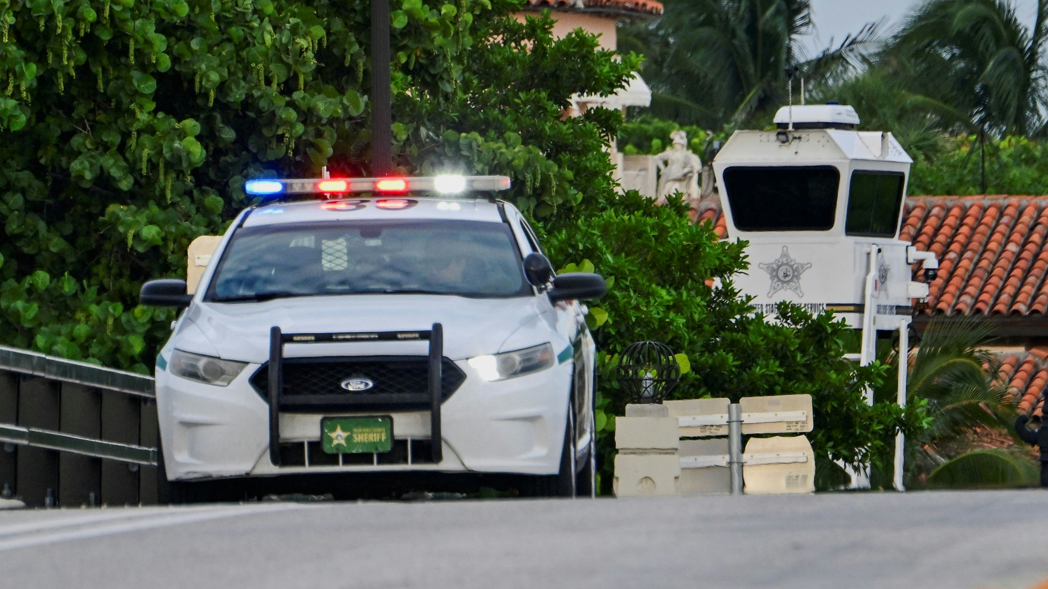 A law enforcement officer patrols the surroundings of Mar-A-Lago, where the residence of Republican presidential nominee and former U.S. President Donald Trump is, after an apparent assassination attempt on him at his Florida golf course, in Palm Beach, Florida, U.S. September 16, 2024. REUTERS/Giorgio Viera