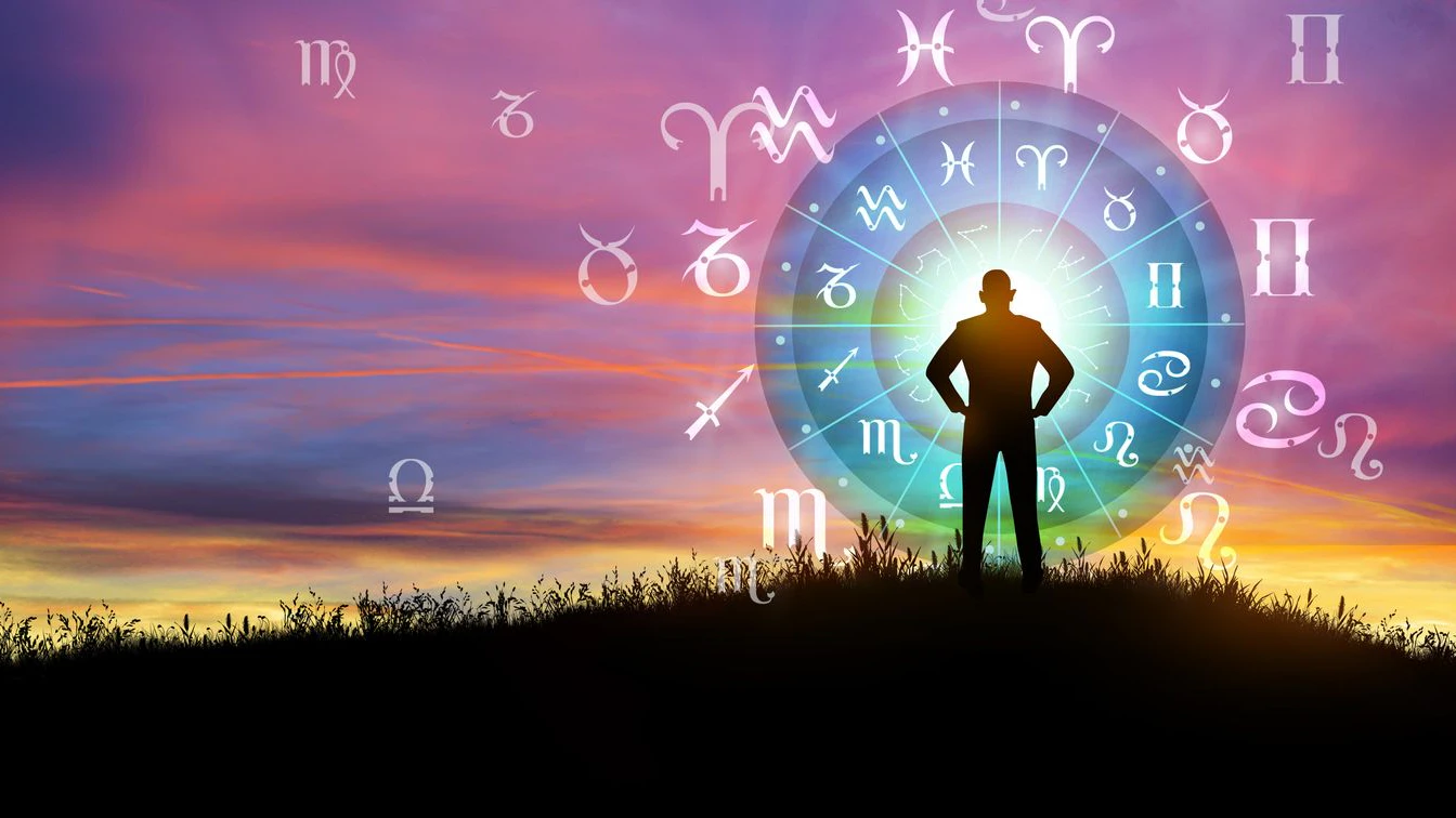 Astrological zodiac signs inside of horoscope circle. Illustration of Man silhouette consulting the Sun over the zodiac wheel and Sunrise background. The power of the universe concept.