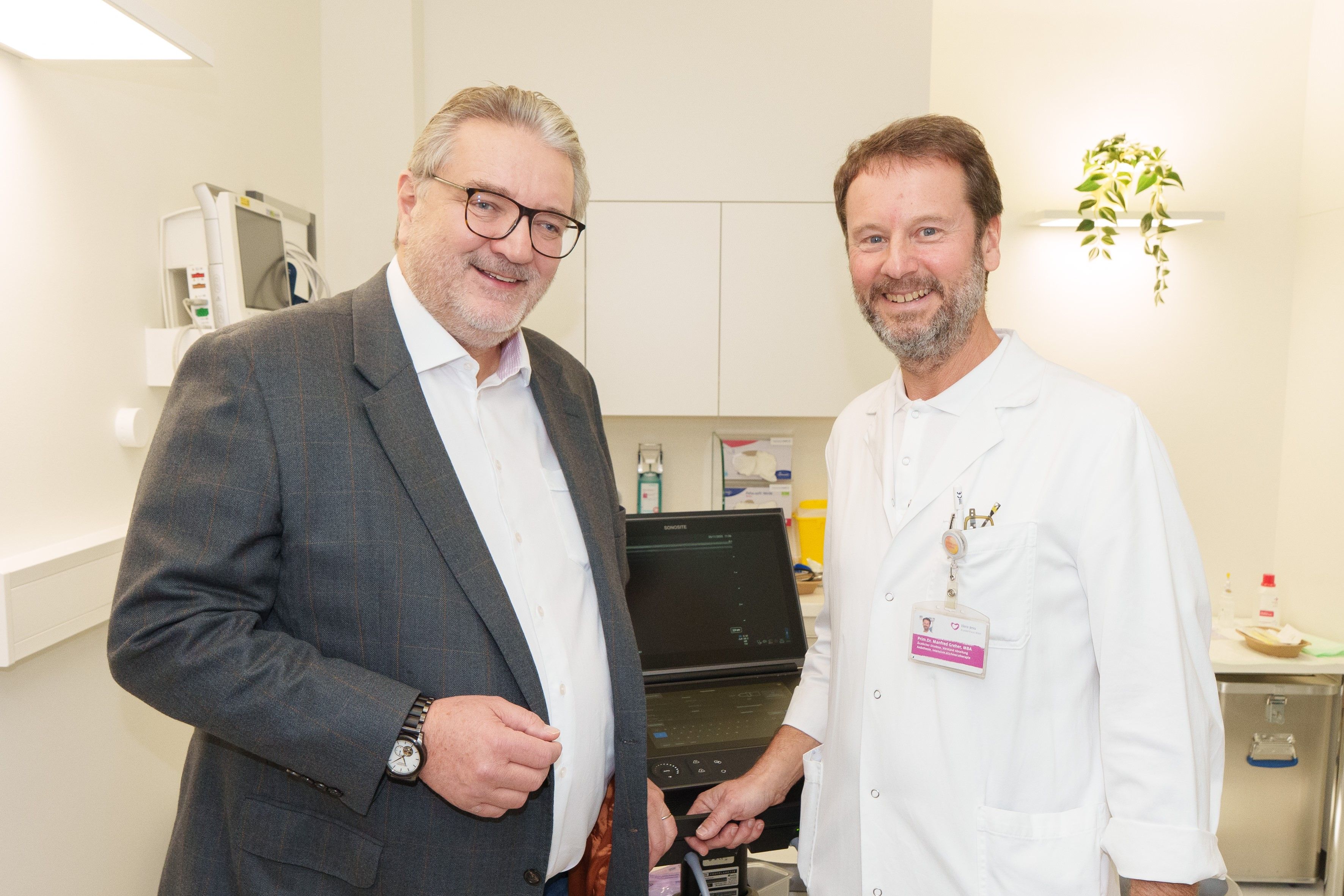 Peter Hacker und Primar Manfred Greher.