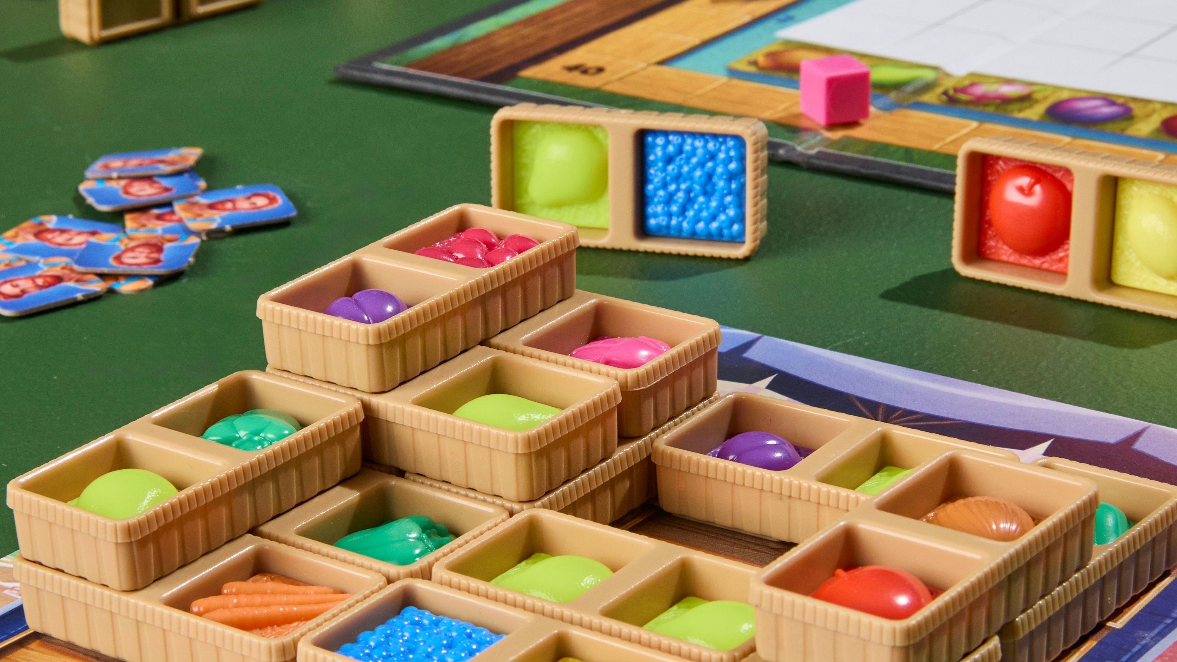 Für jede Kiste, die sie ihrem Stand hinzufügen können, erhalten die Spieler Punkte.