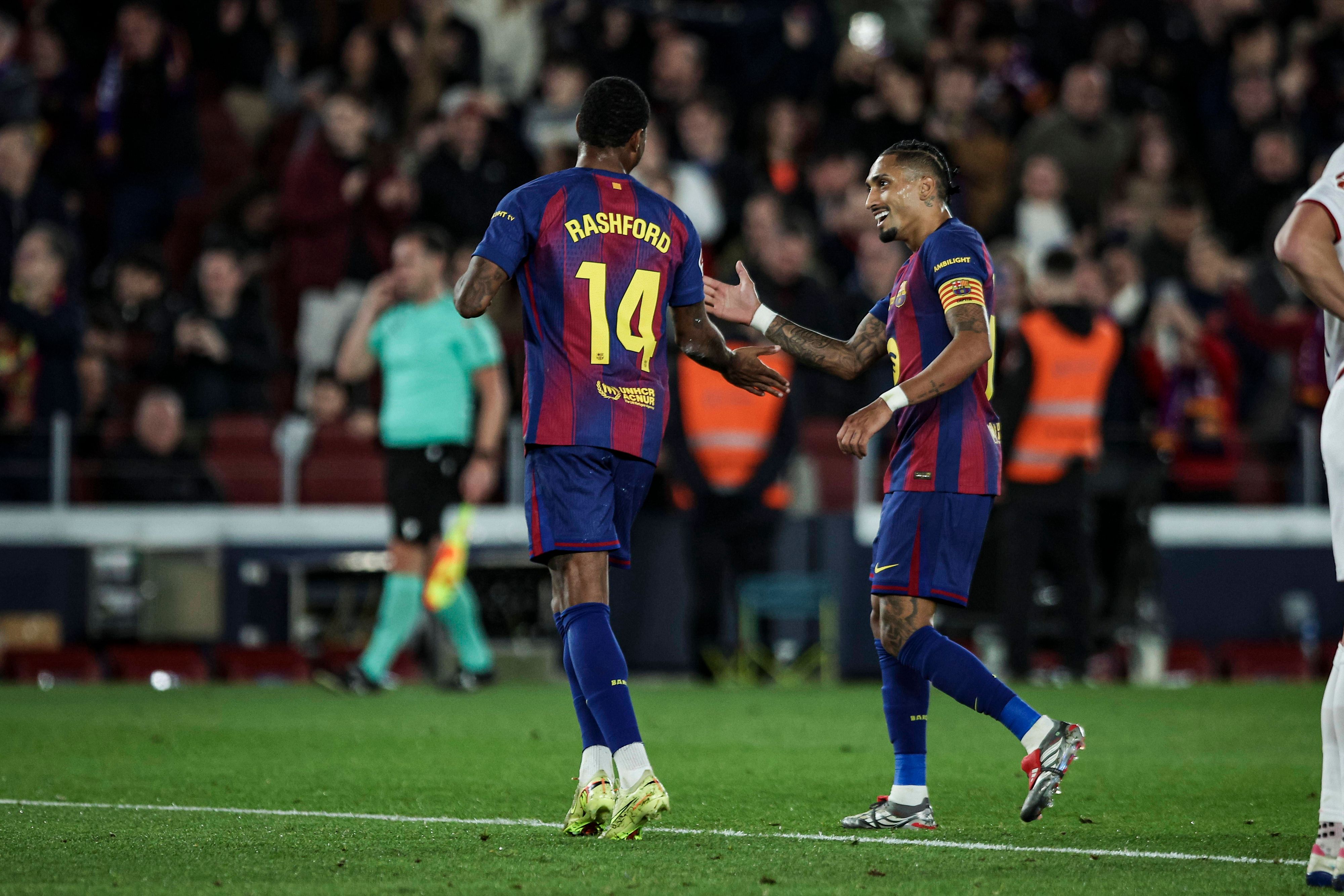 Marcus Rashford und Raphina jubeln zusammen. 