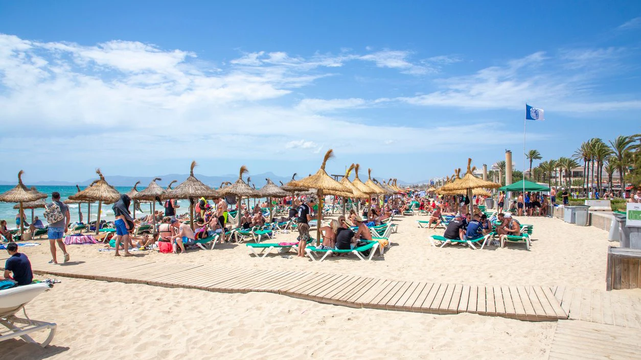 Palma de Mallorca, Spain - June 22, 2022: beach at gate 6 with promenade in Palma de Mallorca, called in German Ballermann - engl. Funman.