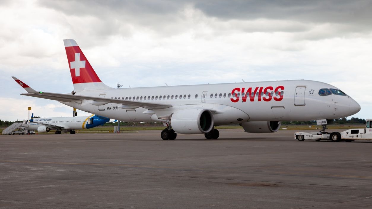 Ukraine, Kyiv - July 8, 2020: Passenger aircraft. Airbus A220 - MSN 55013 - HB-JCD. Boryspil International Airport. Plane arrival of the aircraft on the platform. Apron runway.