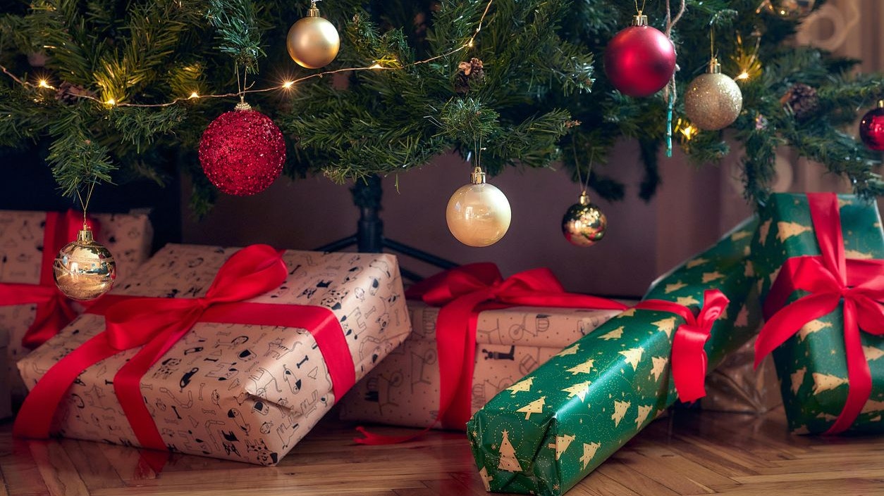 Xmas presents under the tree on a Xmas evening