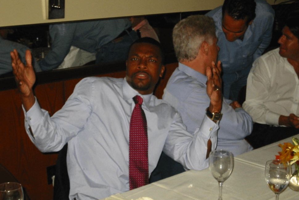 Hollywood-Comedian Chris Tucker, im Hintergrund ist wieder Bill Clinton zu sehen