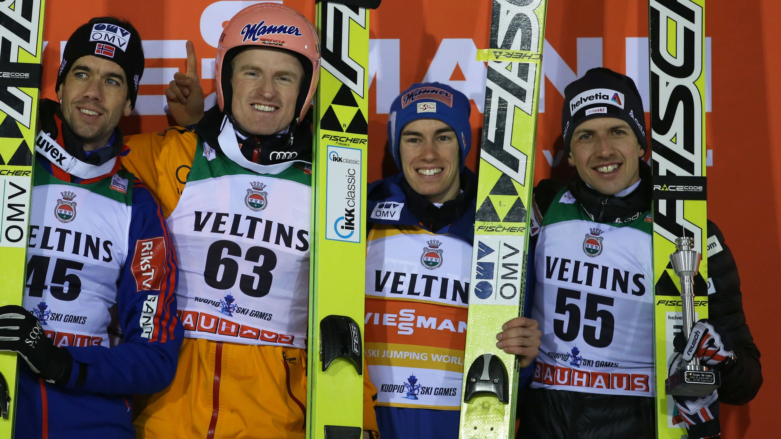 KUOPIO,FINLAND,10.MAR.15 - NORDIC SKIING, SKI JUMPING - FIS World Cup, normal hill, men, award ceremony. Image shows the rejoicing of Anders Bardal (NOR), Severin Freund (GER), Stefan Kraft (AUT) and Simon Ammann (SUI). Keywords: OMViking Helm. Photo: GEPA pictures/ Daniel Goetzhaber