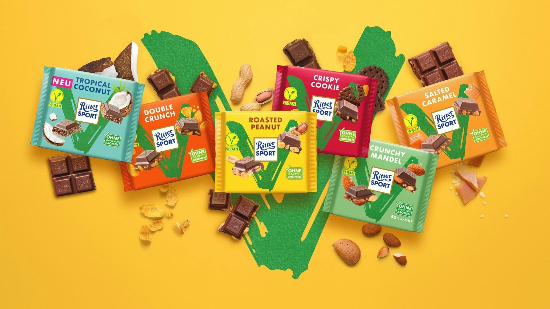 Das pflanzliche Sortiment: die neue Tropical Coconut, Double Crunch, Roasted Peanut, Crispy Cookie, Crunchy Mandel und Salted Caramel