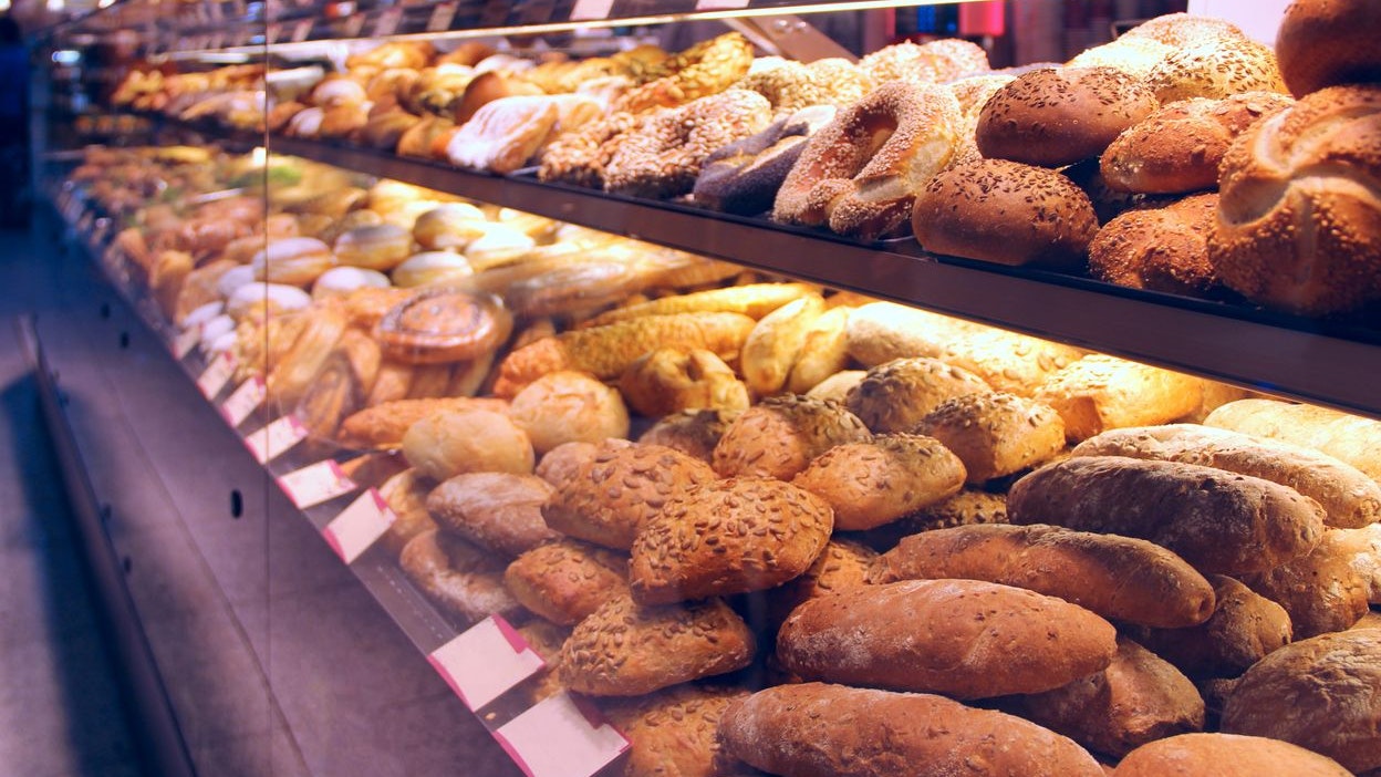 Bread on showcase in supermarket, close-up view