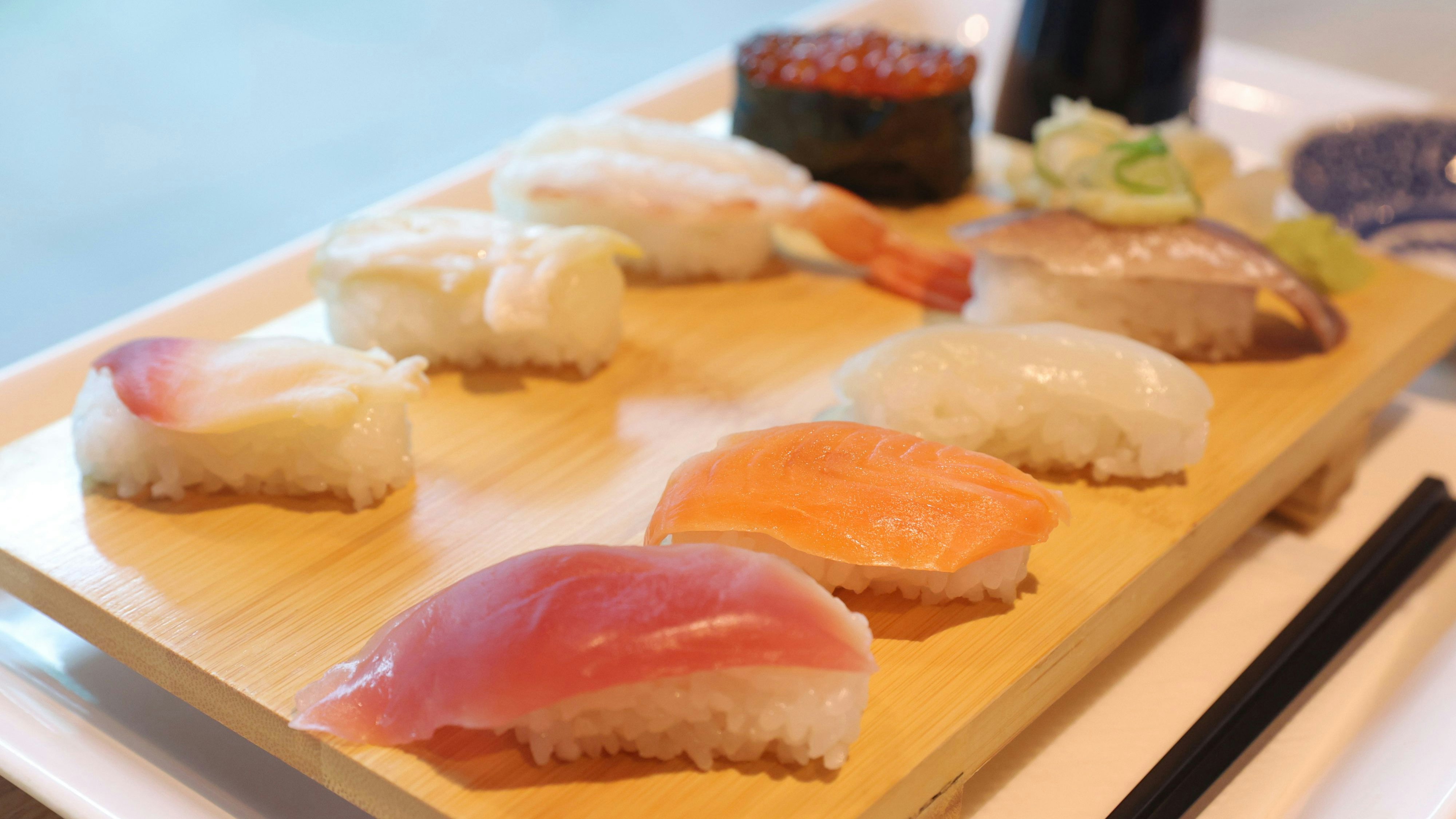 Sushi topped with various toppings is served at Sushi Restaurant Shiome no Umi at Aquamarine Fukushima in Iwaki City, Fukushima Prefecture, Japan, on September 27, 2025. The sushi restaurant located in front of the "Shiome no giant tank" on the second floor of the aquarium, primarily serves "neta," a type of fish with stable resource availability. The aquarium aims to send a message of concern for the growing global population and the sustainable use of marine resources. ( The Yomiuri Shimbun via AP Images )