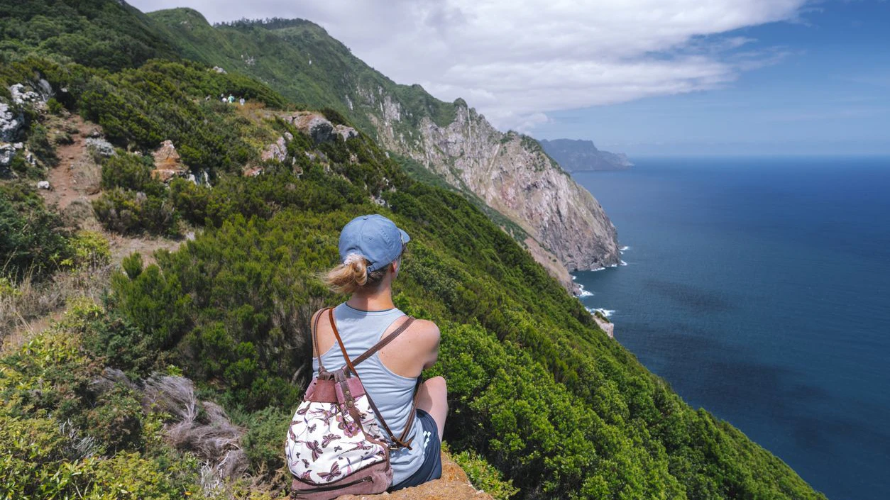 Woman enjoys the landscape of  Madeira Portugal