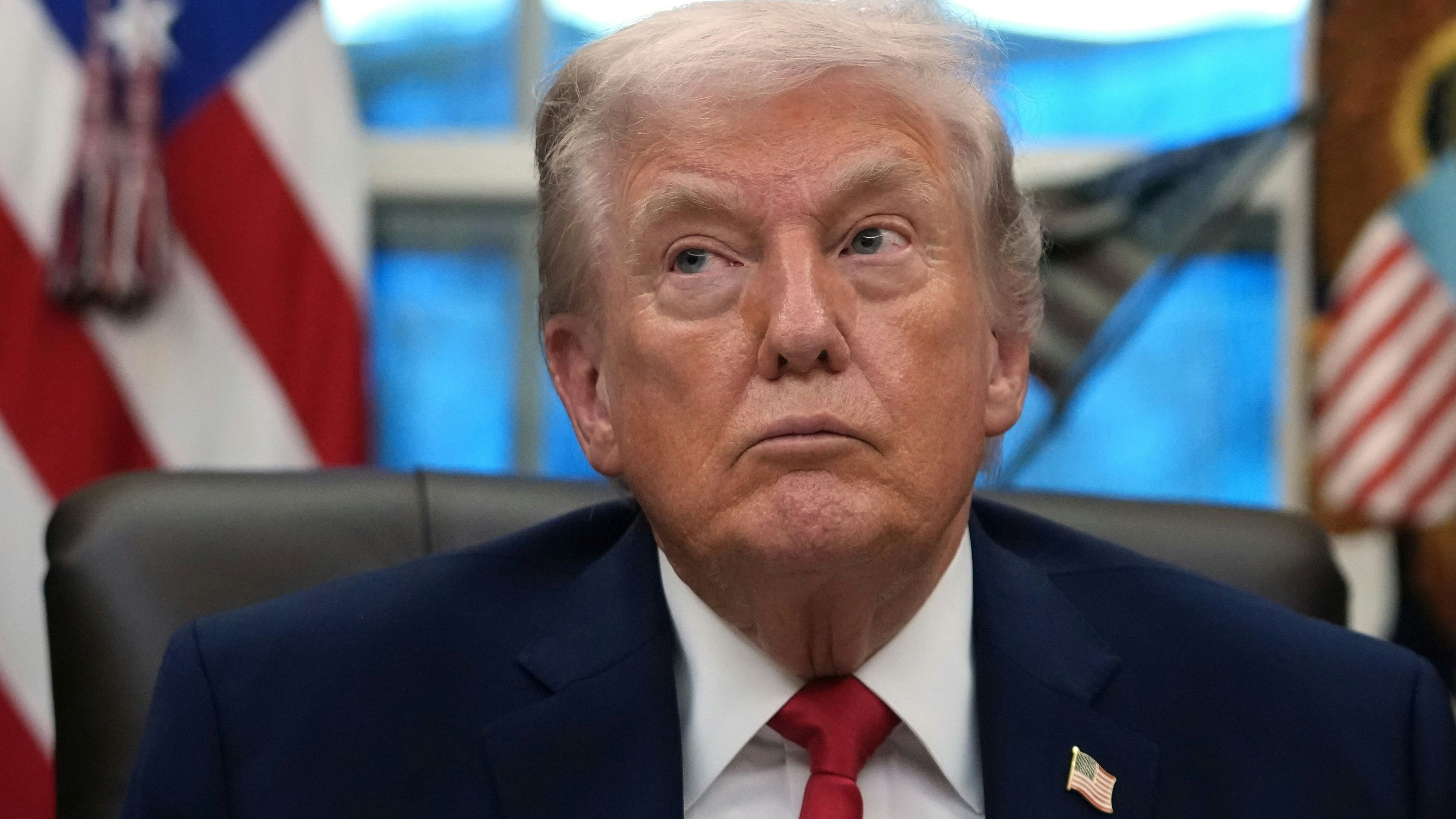 President Donald Trump listens during an event on addiction recovery in the Oval Office of the White House, Thursday, Jan. 29, 2026, in Washington. (AP Photo/Allison Robbert)