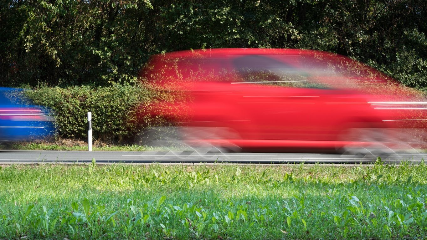 Road with cars in motion