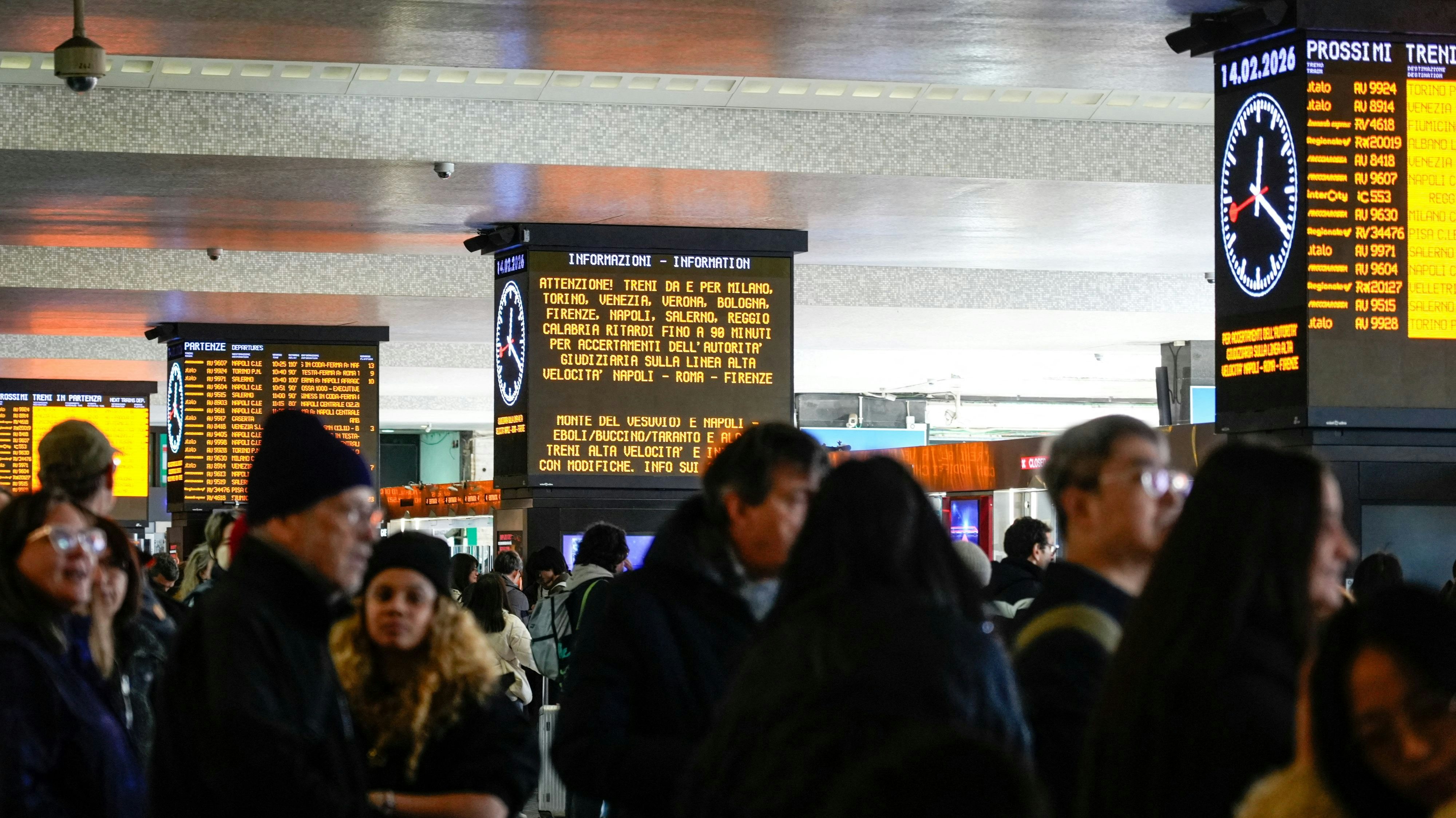Passengers wait inside Termini train station after train services in Italy were disrupted during the Olympics, at a railway station in Rome, Italy, February 14, 2026. REUTERS/Matteo Ciambelli