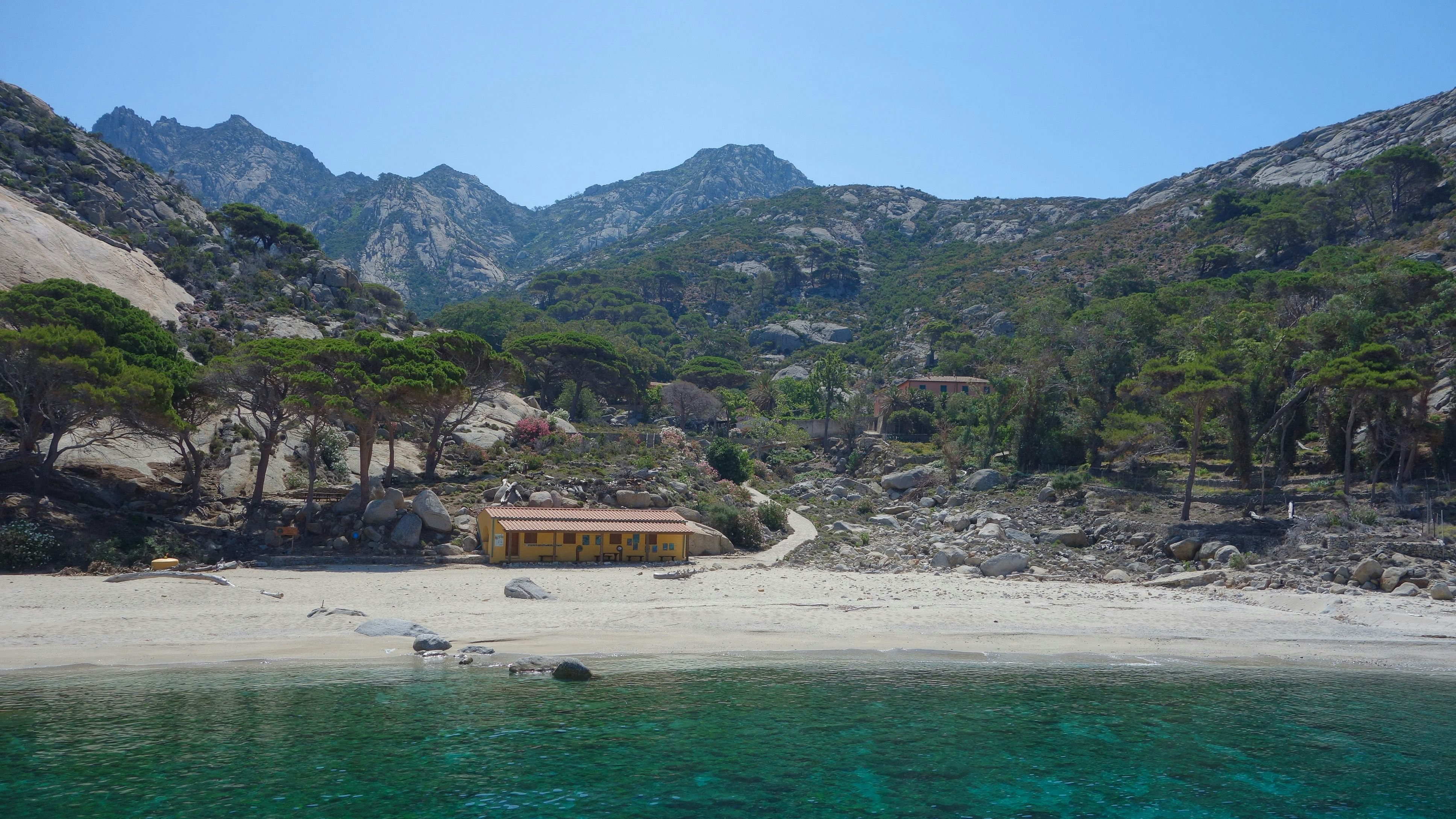 Cala Maestra beach at Island of Montecristo (formerly Oglasa) in the Tyrrhenian Sea part of the Tuscan Archipelago in Portoferraio, Italy