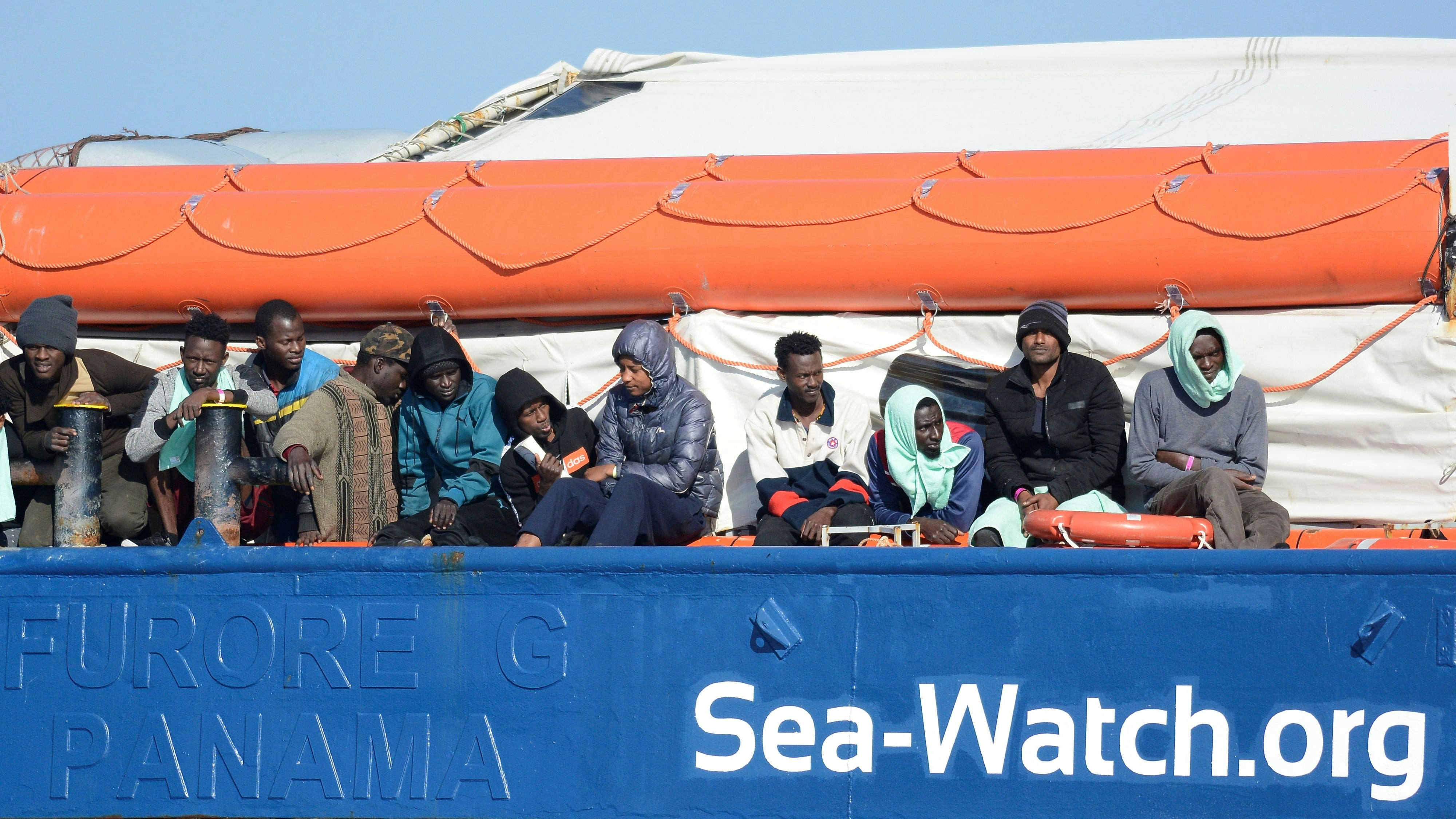 Migrants rest on board the Sea Watch 3 off the coast of Siracusa, Italy, January 27, 2019. REUTERS/Guglielmo Mangiapane