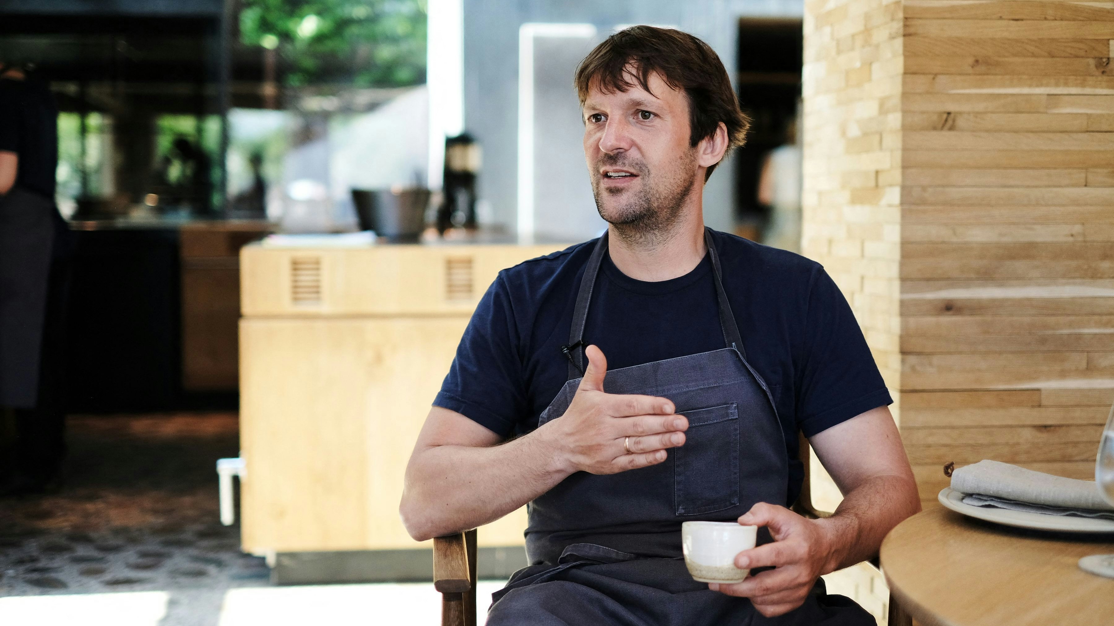 Rene Redzepi, chef and co-owner of the World class Danish restaurant Noma is pictured on May 31, 2021 in Copenhagen. - While the six-month Covid-19 closure has been tough for Noma, consistently ranked as one of the world's top restaurants, it's also been an opportunity to reinvent its cuisine As it reopened this June, the restaurant has reworked its menu -- in part to take the lack of foreign tourists into account. (Photo by Thibault Savary / AFP)