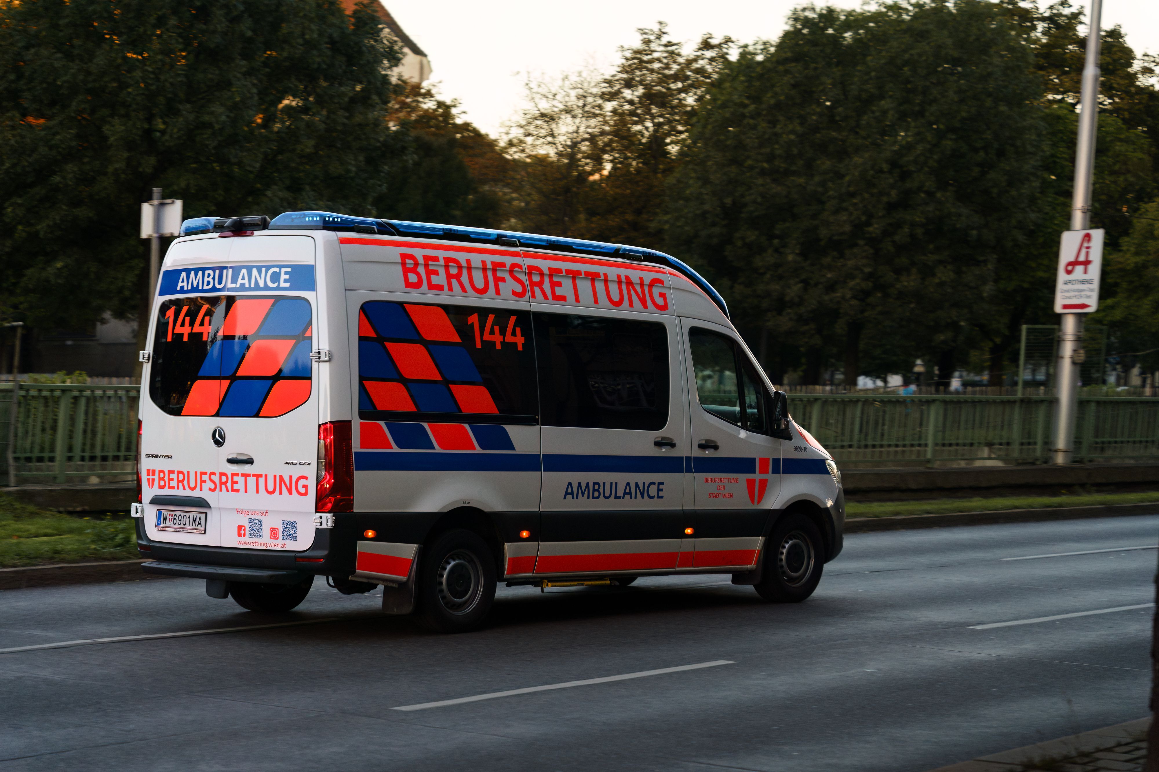 Vienna, Austria - October 4, 2025 - Ambulance driving on the street.