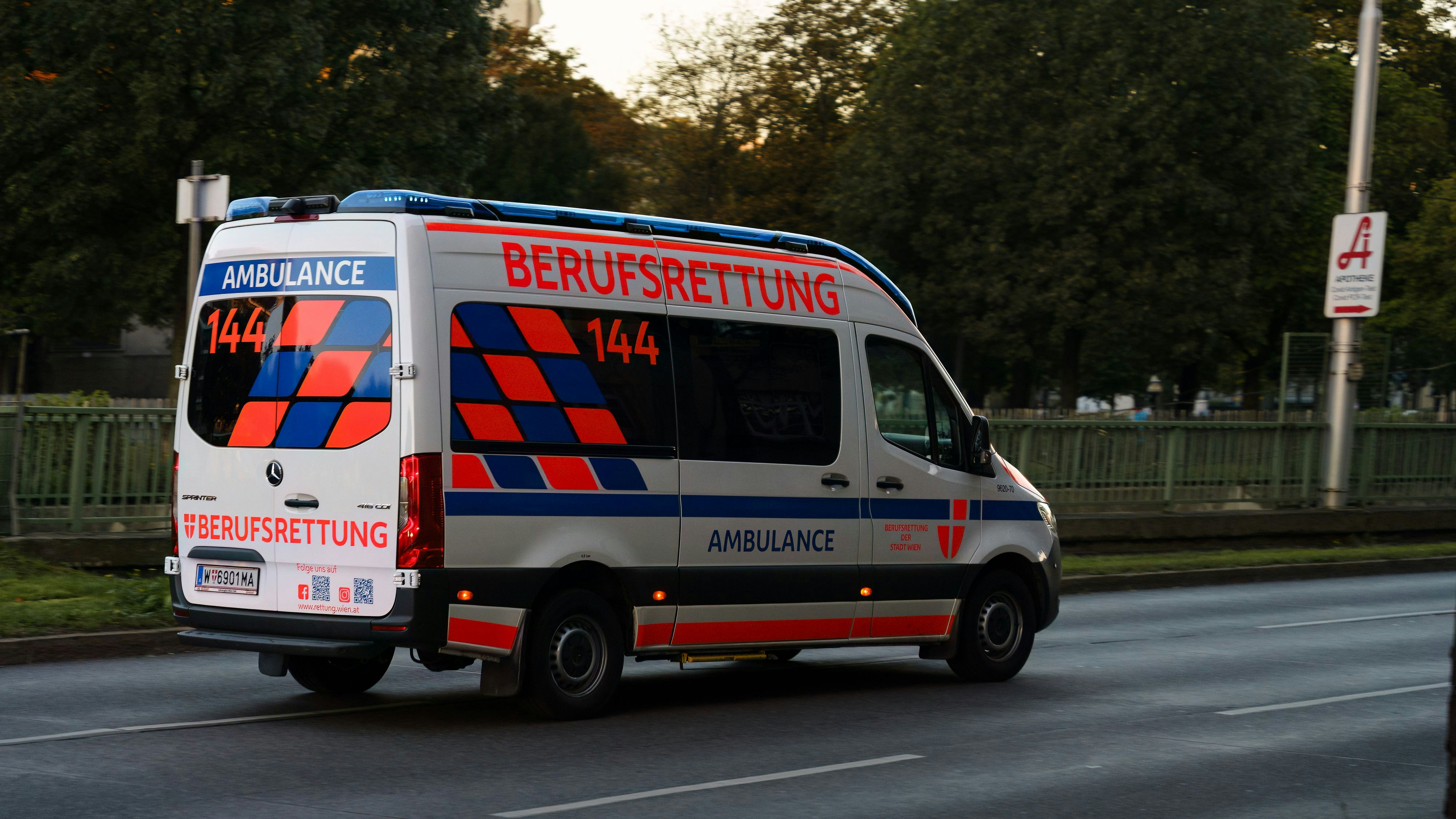 Vienna, Austria - October 4, 2025 - Ambulance driving on the street.