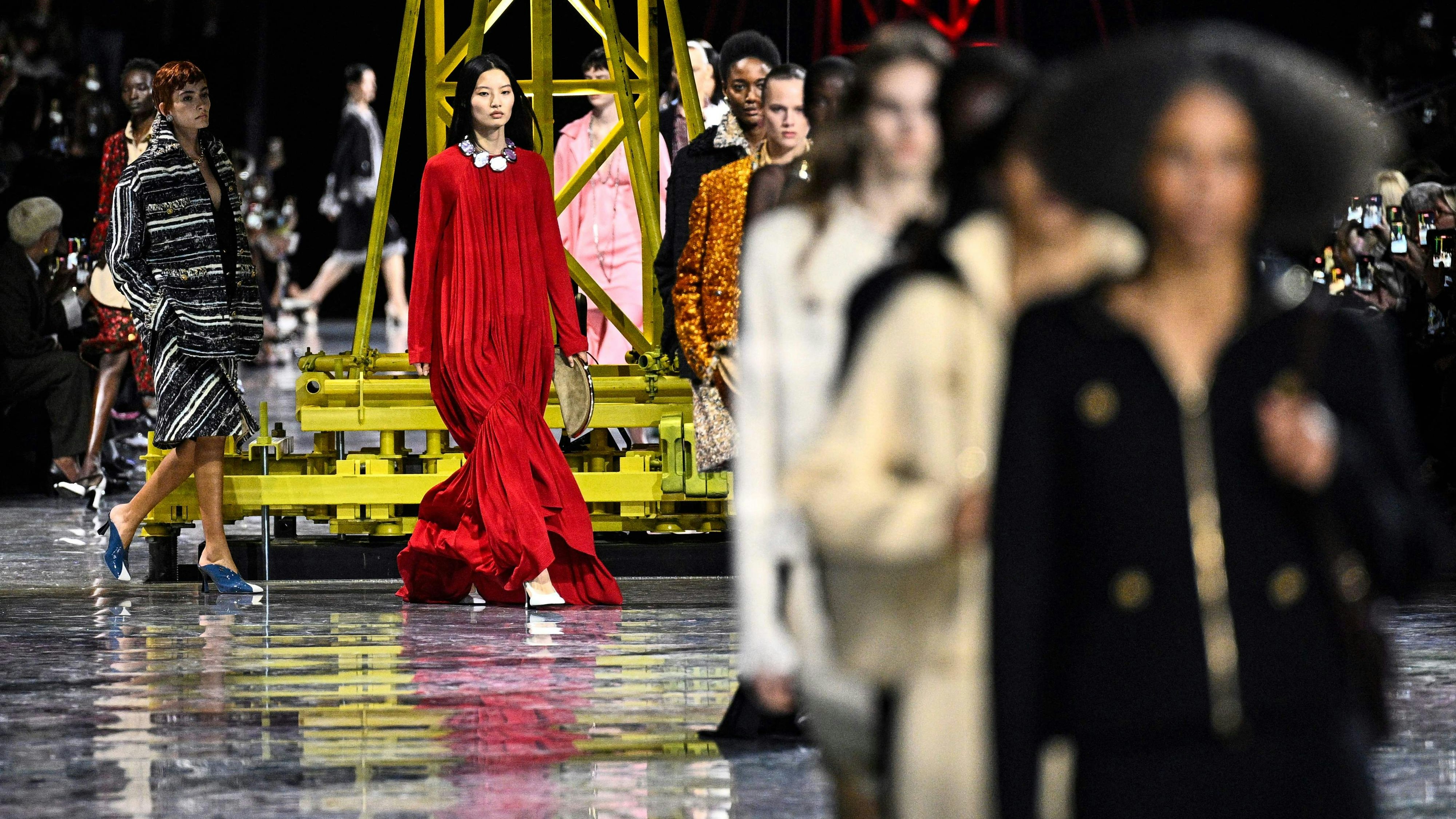 Models present creations for Chanel for the Women's Ready to Wear Fall/Winter 2026-2027 collection fashion show as part of the Paris Women Fashion Week, in Paris, on March 9, 2026. (Photo by JULIEN DE ROSA / AFP)