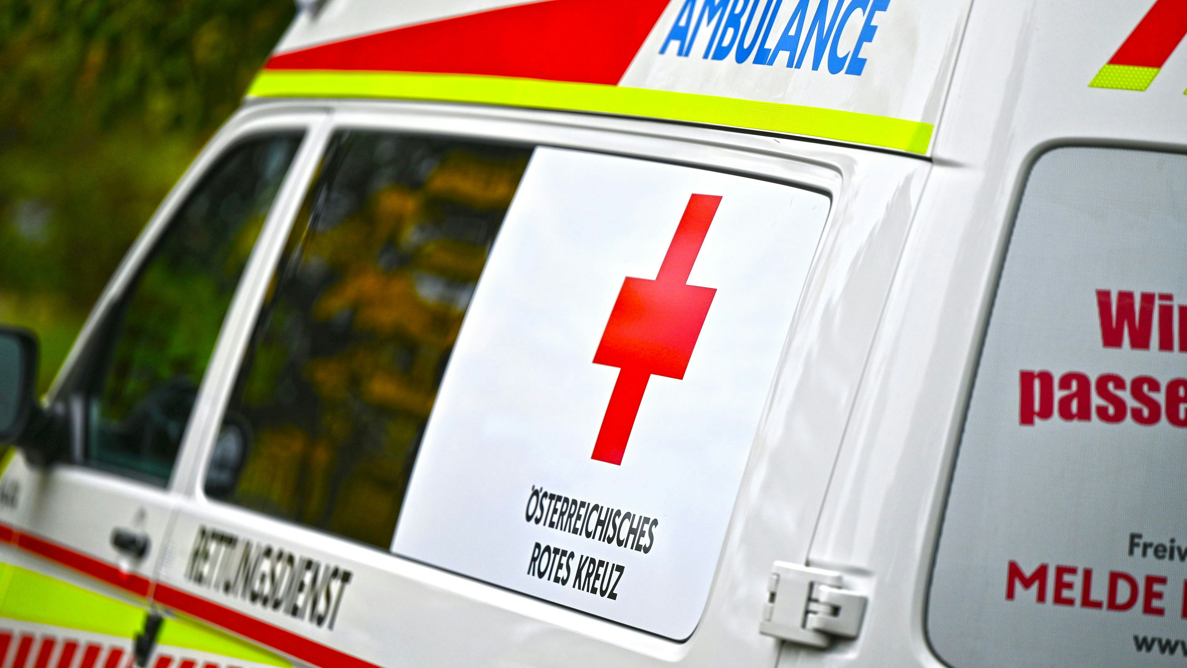 A Red Cross rescue vehicle from the side an from behind in Lower Austria