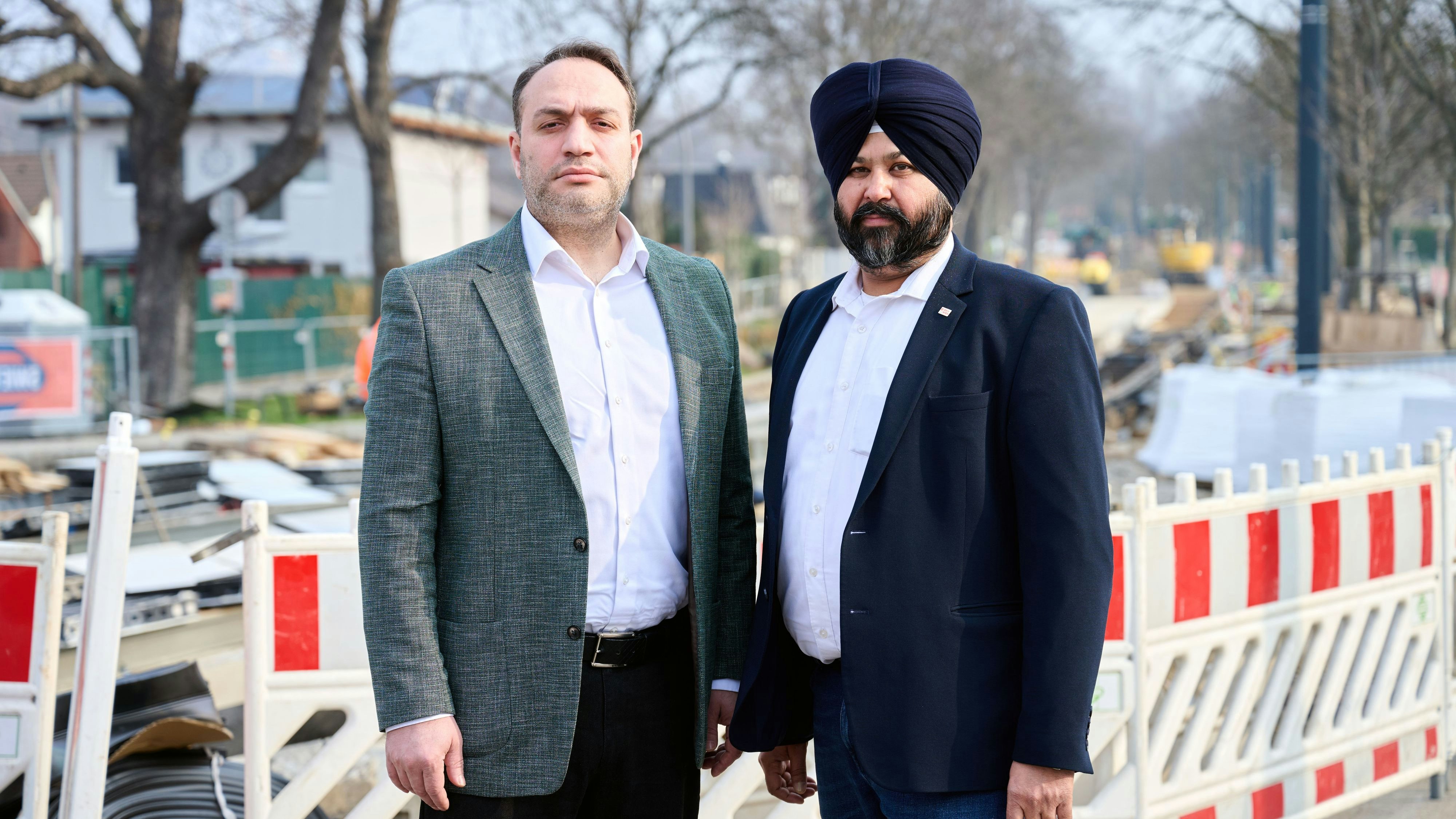 Resul Ekrem Gönültaş Obmann der Wiener Taxi-Innung, und Gurdial Singh Bajwa, Obmann der Wiener Kleintransporteure