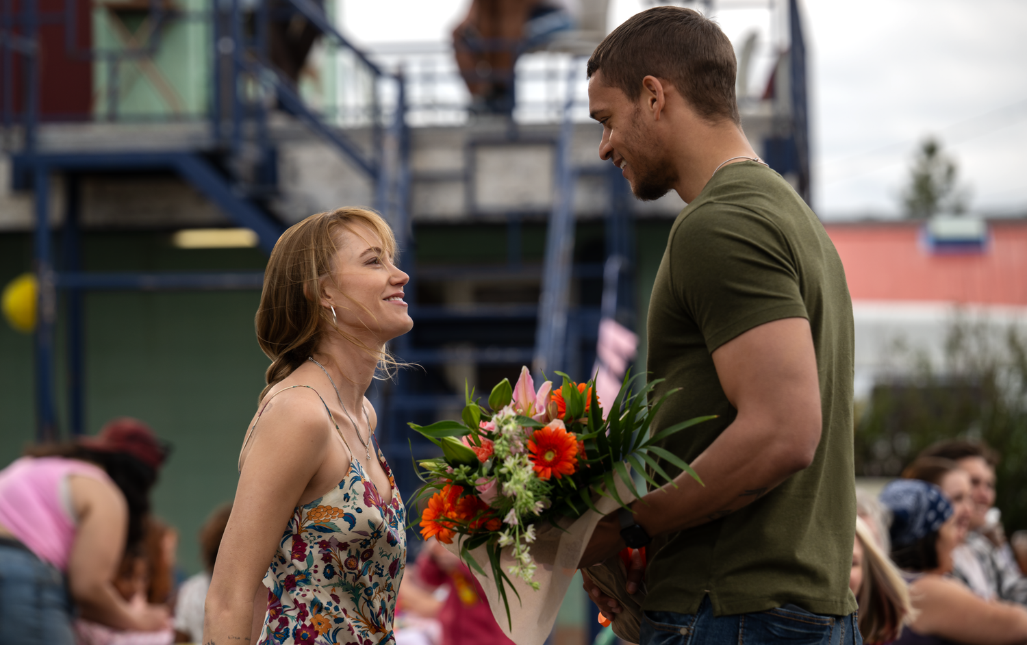(from left) Kenna Rowan (Maika Monroe) and Ledger Ward (Tyriq Withers) in REMINDERS OF HIM, directed by Vanessa Caswill.