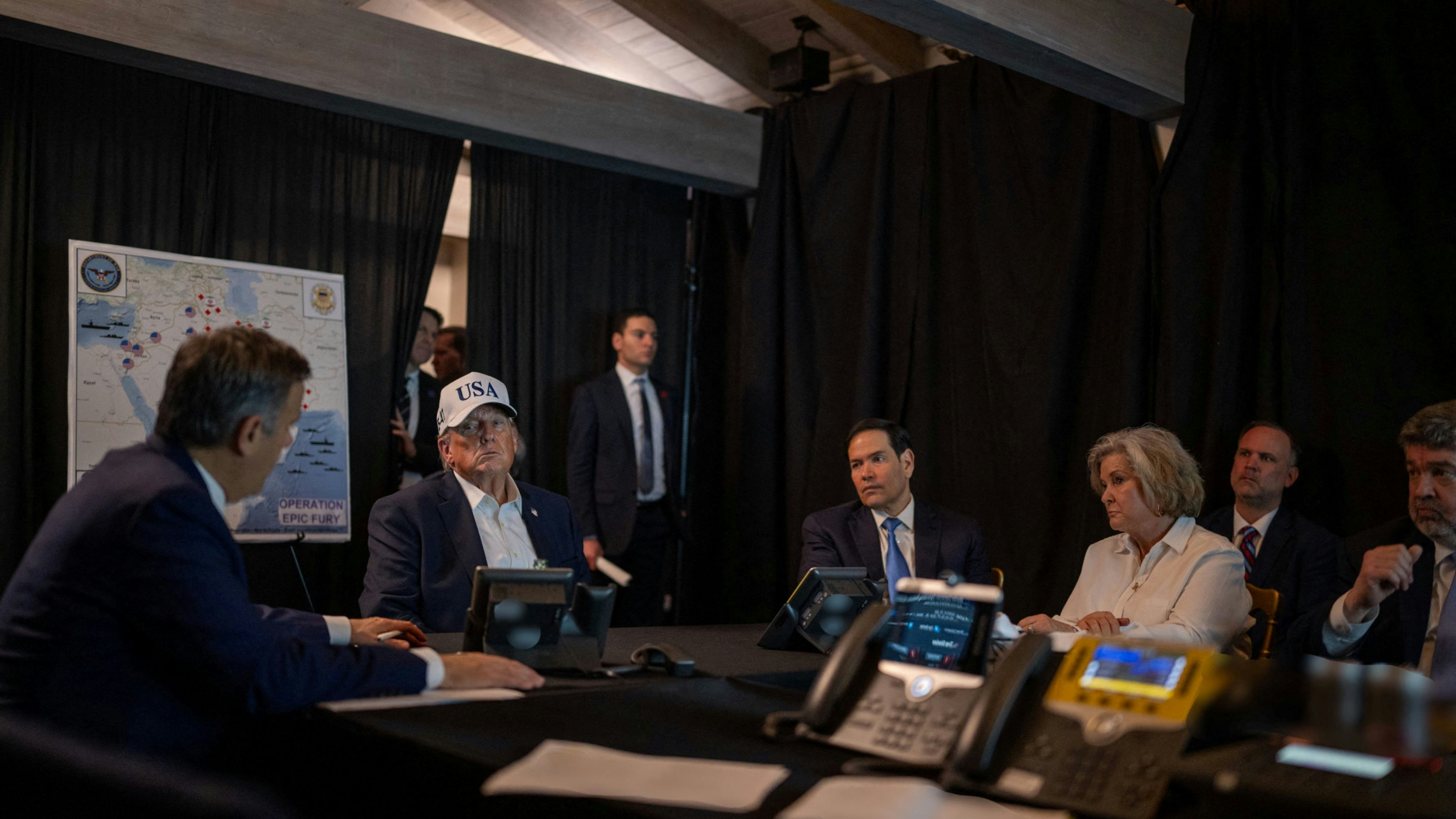 U.S. President Donald Trump speaks with CIA Director John Ratcliffe, accompanied by White House Chief of Staff Susie Wiles and Secretary of State Marco Rubio, during military operations in Iran, at Trump's Mar-a-Lago resort in Palm Beach, Florida, U.S. February 28, 2026.  The White House/Social Media/Handout via REUTERS    THIS IMAGE HAS BEEN SUPPLIED BY A THIRD PARTY. SOME AREAS BLURRED AT SOURCE.