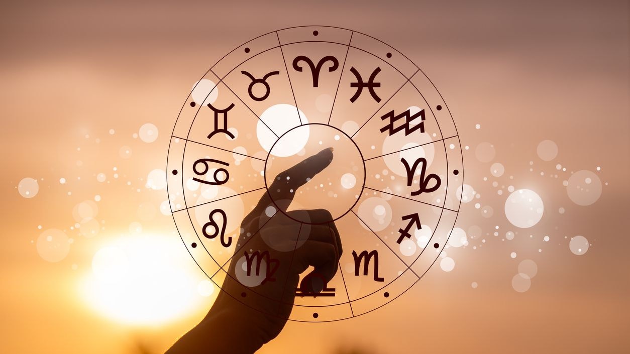 Zodiac signs, astrology and horoscopes concepts. Zodiac signs inside of horoscope circle. Astrology in the sky with many stars and moons astrology and horoscopes concept