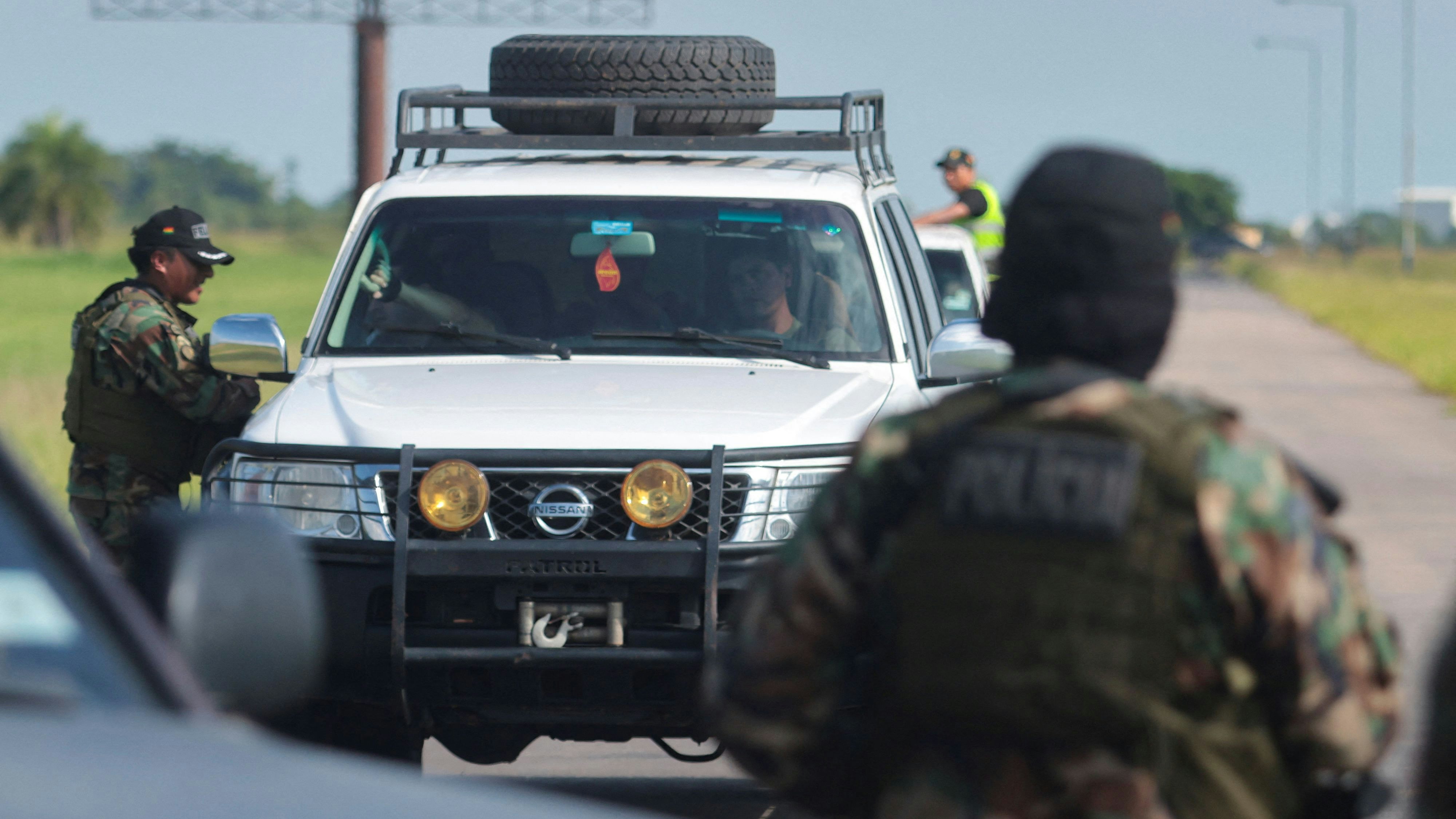 Members of the Bolivian police elite force UMOPAR (Mobile Police Unit for Rural Areas) guard one of the access points to Viru Viru International Airport after Bolivian security authorities carried out an operation to arrest alleged Uruguayan drug trafficker Sebastian Marset, accused of leading the First Uruguayan Cartel and wanted by Interpol for organized crime and money laundering charges, in Santa Cruz de la Sierra, Bolivia, March 13, 2026. REUTERS/Ipa Ibanez