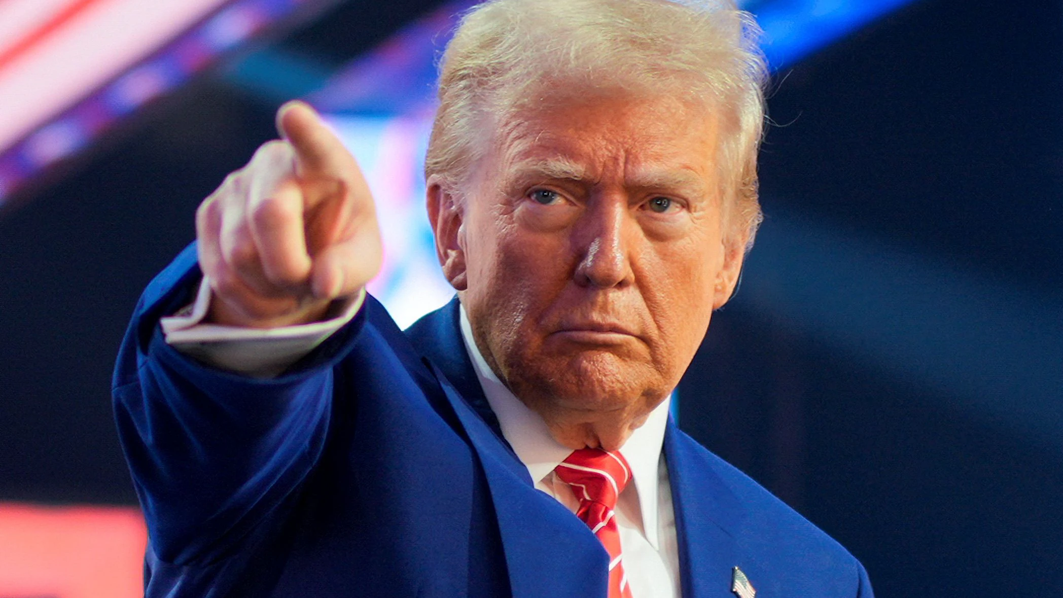 U.S. President-elect Donald Trump gestures at Turning Point USA's AmericaFest in Phoenix, Arizona, U.S., December 22, 2024.  REUTERS/Cheney Orr