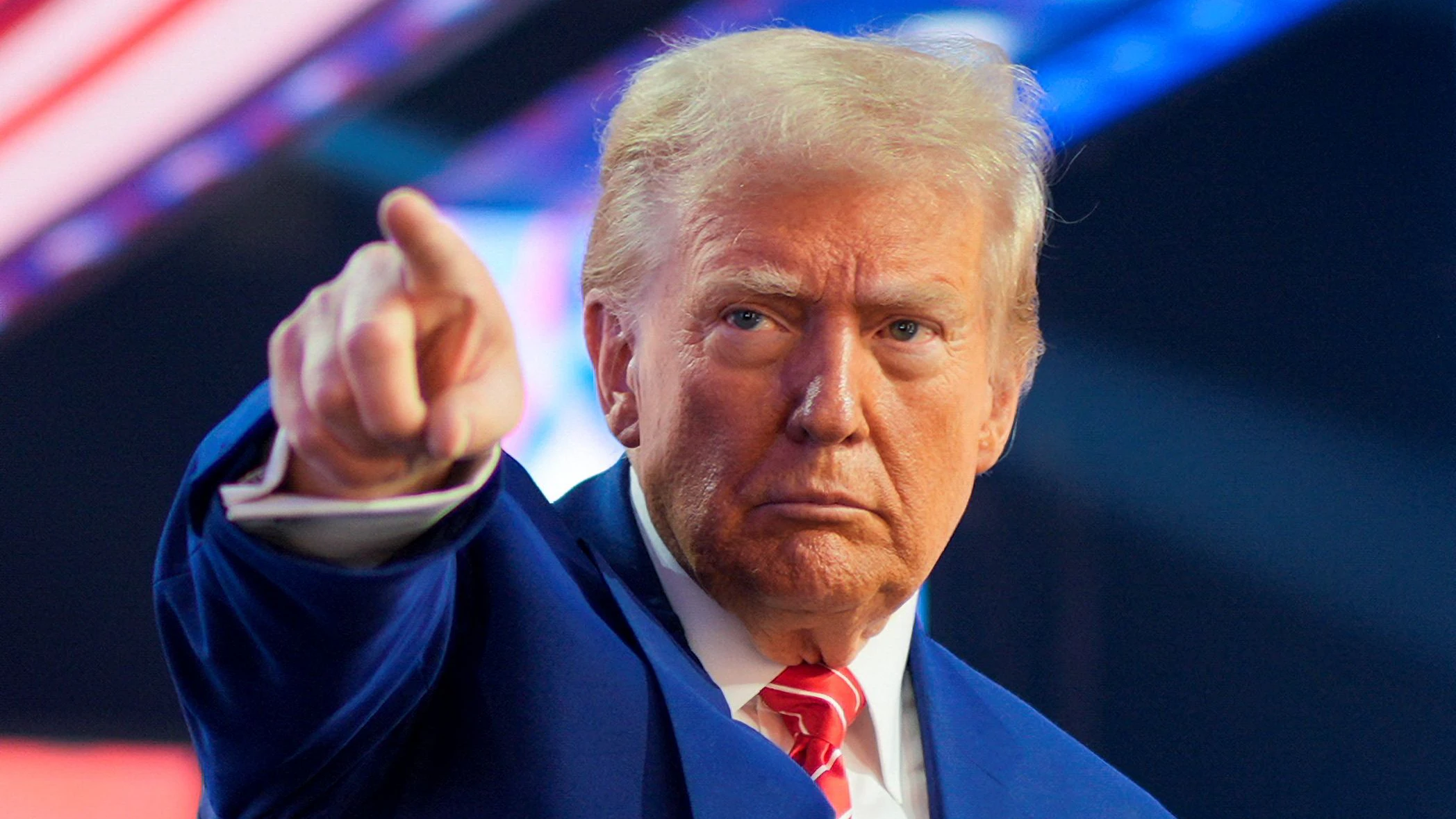 U.S. President-elect Donald Trump gestures at Turning Point USA's AmericaFest in Phoenix, Arizona, U.S., December 22, 2024.  REUTERS/Cheney Orr