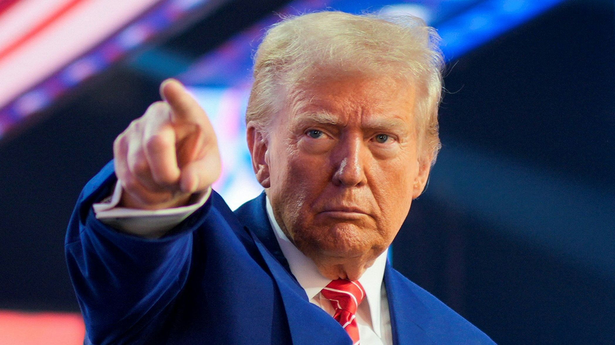 U.S. President-elect Donald Trump gestures at Turning Point USA's AmericaFest in Phoenix, Arizona, U.S., December 22, 2024.  REUTERS/Cheney Orr
