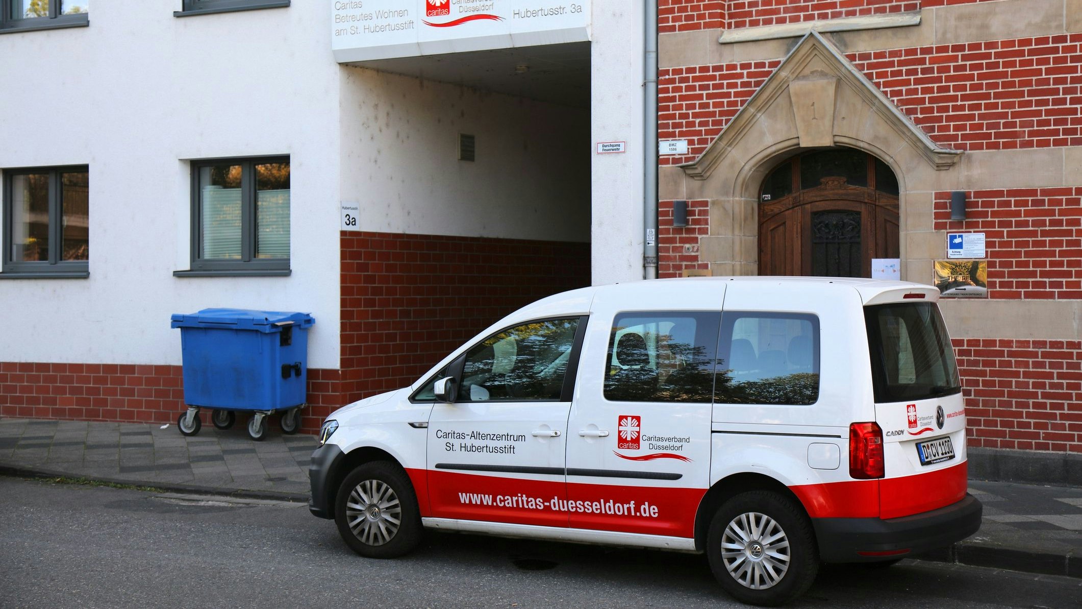 Caritas office and vehicle in Dusseldorf, Germany. Caritas is a Roman Catholic relief organization.