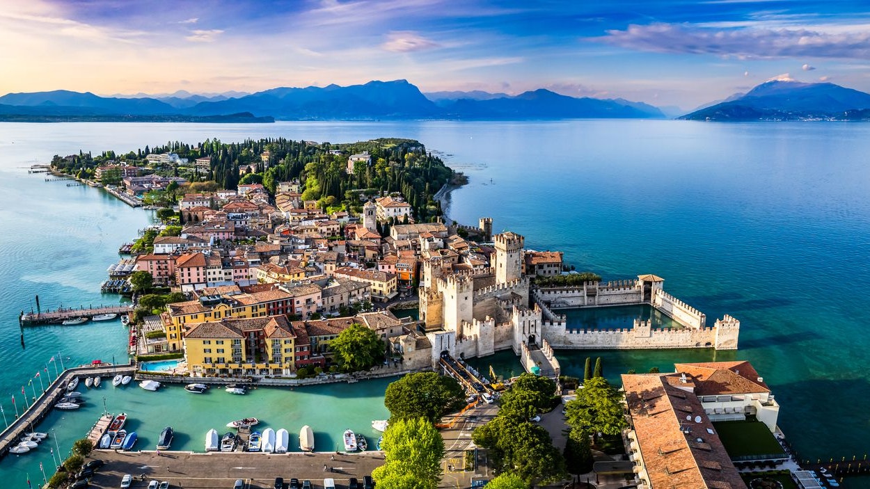 old town and port of Sirmione in italy - lago di garda