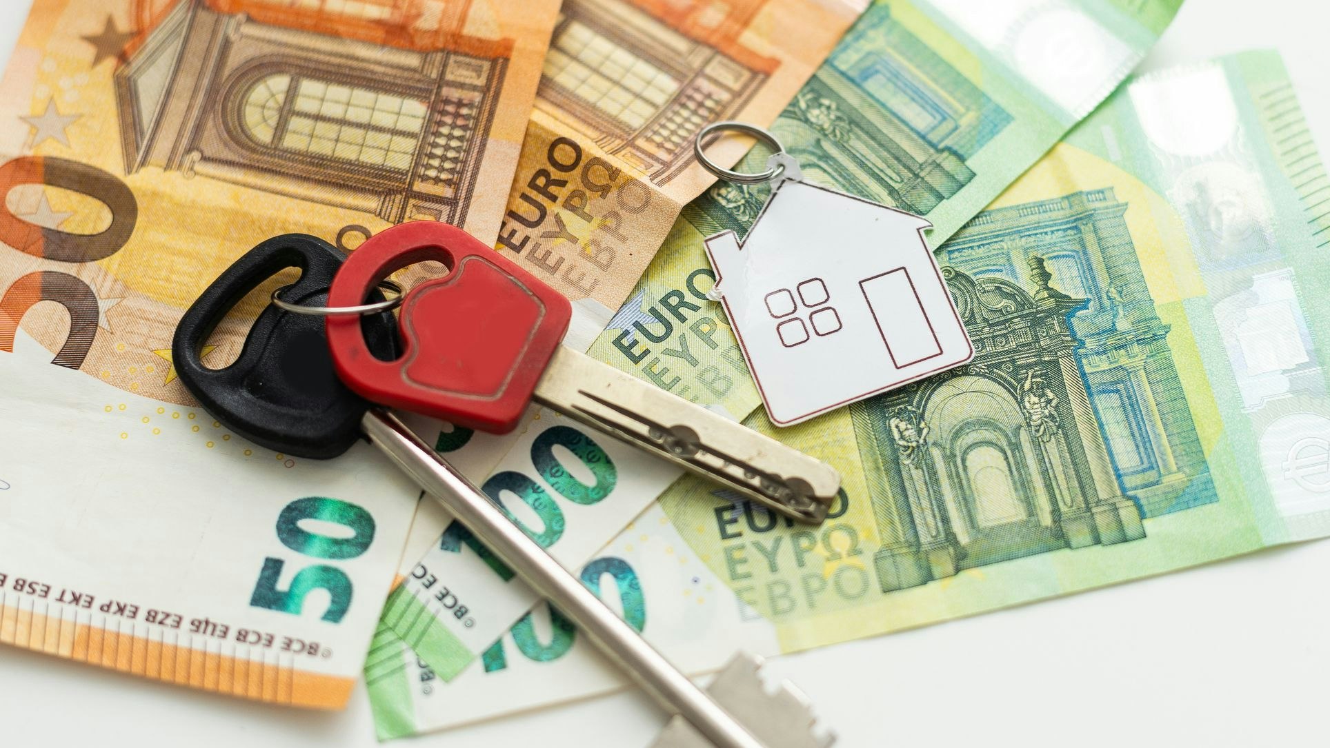 key for the house lyi on polish money, pln. real estate concept. High quality photo