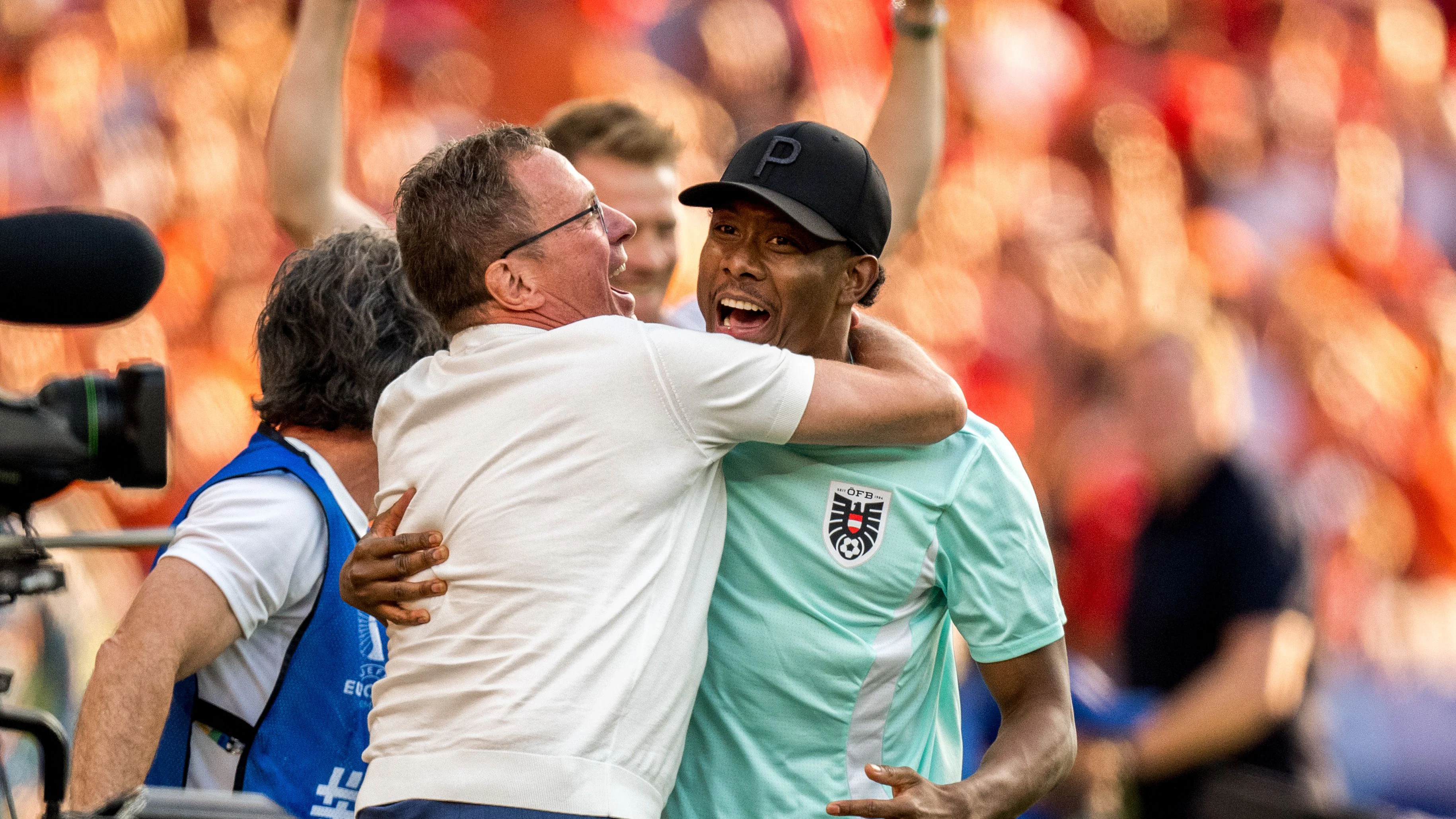 BERLIN,GERMANY,25.JUN.24 - UEFA EURO 2024, group stage, Austria vs Netherlands. Image shows the rejoicing of head coach Ralf Rangnick and David Alaba (AUT). Photo: GEPA pictures/ Johannes Friedl
