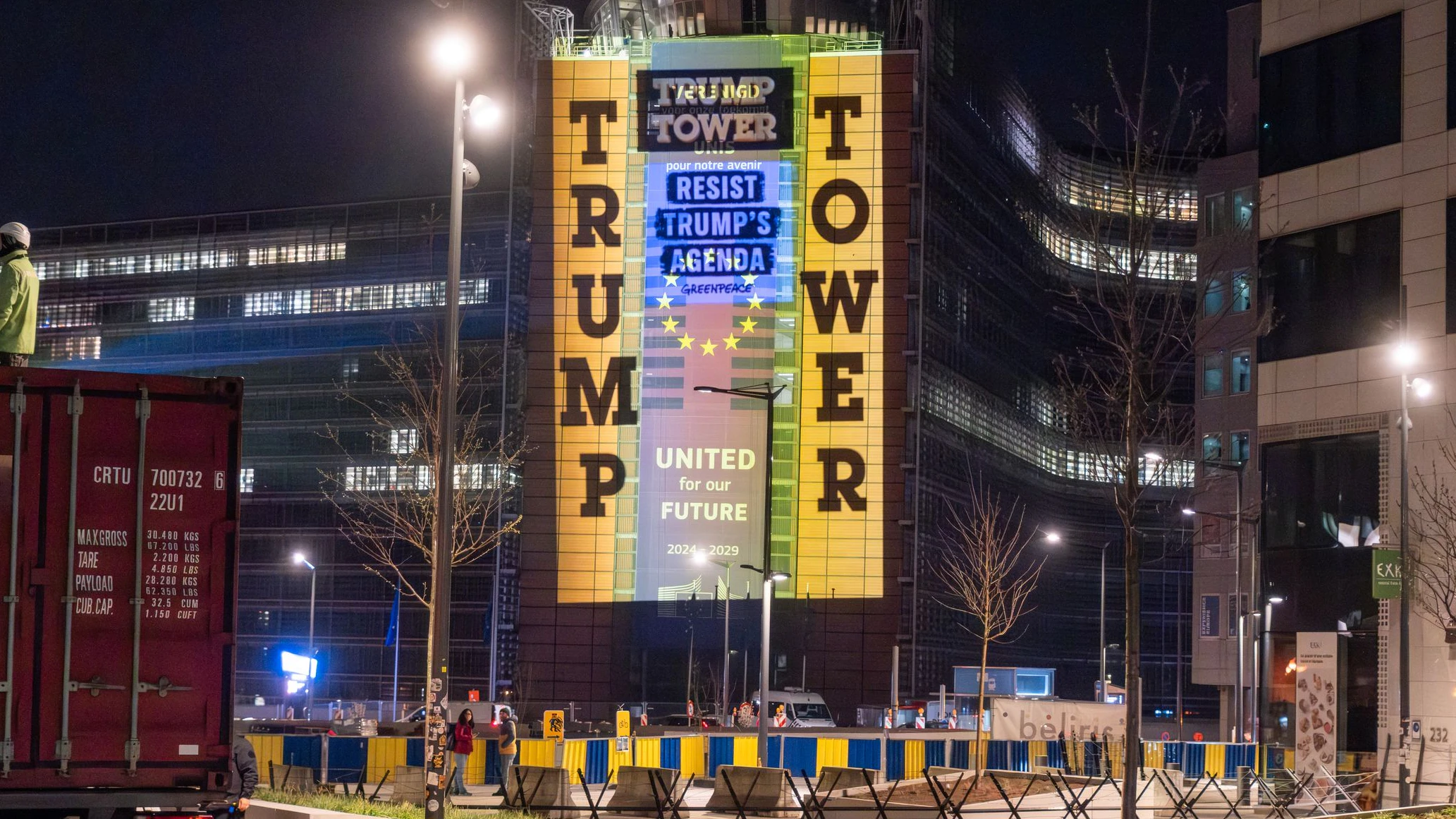 Belgium, Brussels, 19/3/26 Photo: Tim Dirven A projection of a golden facade and the letters “TRUMP TOWER - RESIST TRUMP’S AGENDA” has turned the European Commission headquarters in Brussels into a copy of one of President Trump’s skyscrapers, accusing EU leaders meeting today of capitulating to his demands. The Greenpeace Belgium activists are protesting the EU’s continued dependence on the US for oil and gas imports, the removal of protections for the environment, public health and privacy, and the lack of resistance to the US’s breaches of international law.