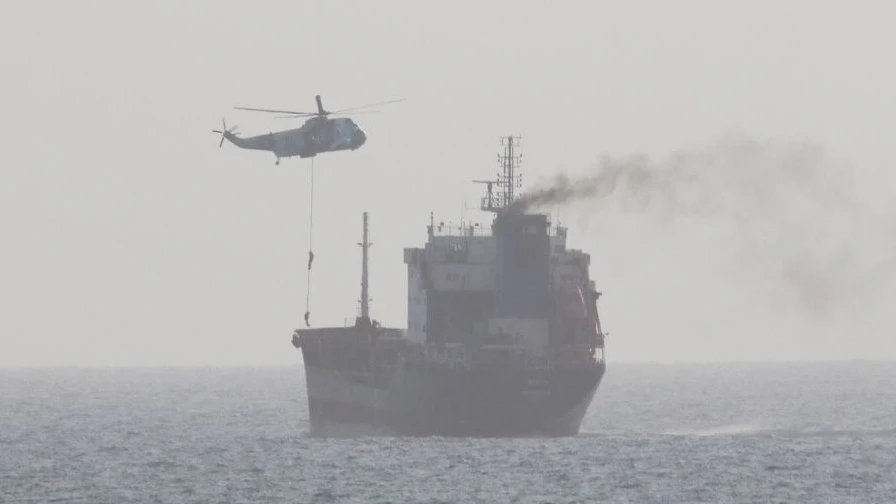 This picture released by the U.S. Navy allegedly shows members of the Iranian forces fast-roping onto civilian tanker WILA en-route to the UAE from a Sea King helicopter, in international waters in the Strait of Hormuz, August 12, 2020. Picture taken on August 12, 2020. U.S. NAVY/Handout via REUTERS. THIS IMAGE HAS BEEN SUPPLIED BY A THIRD PARTY.