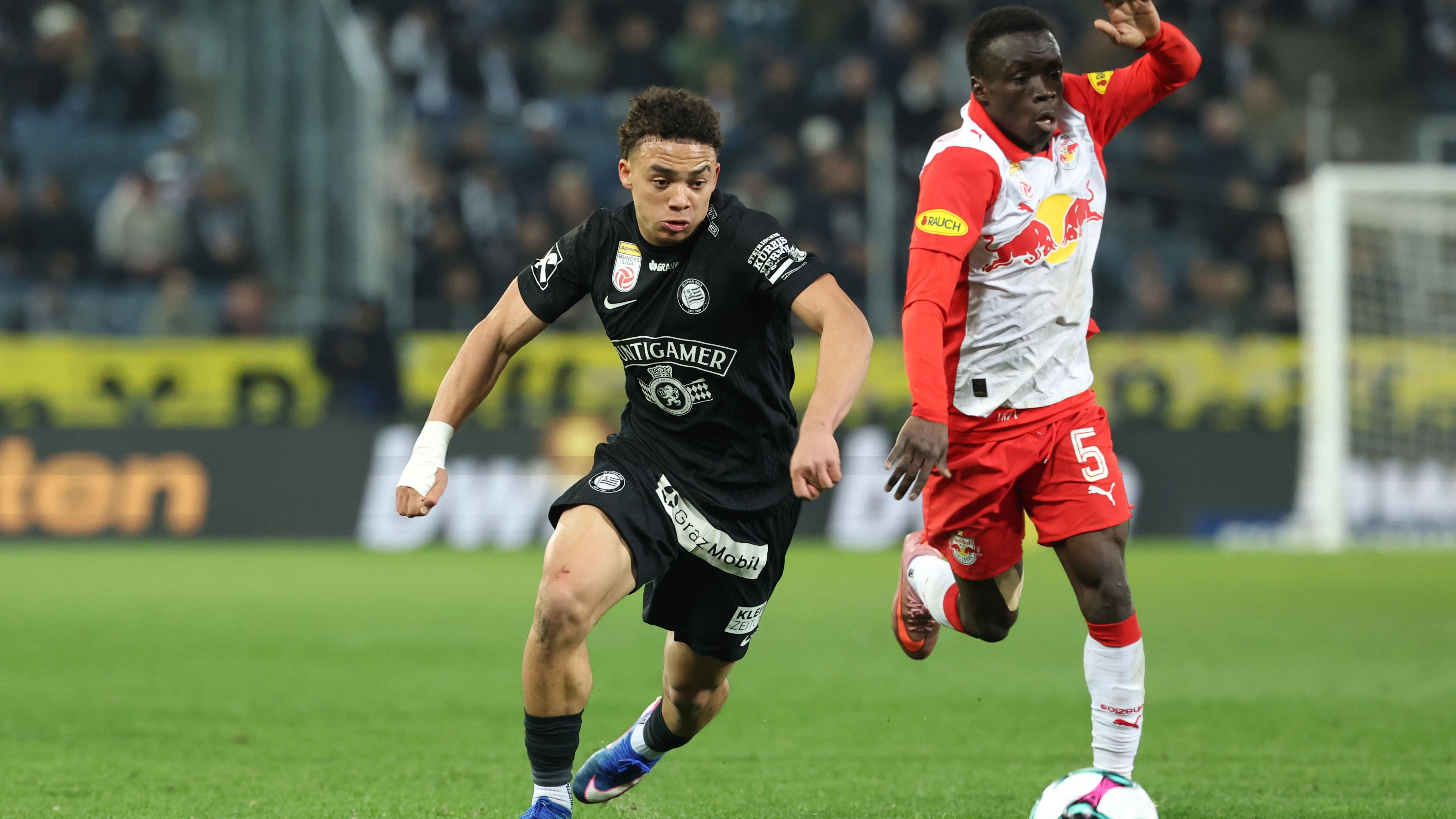 GRAZ,AUSTRIA,20.MAR.26 - SOCCER - ADMIRAL Bundesliga, championship group, SK Sturm Graz vs Red Bull Salzburg. Image shows Jacob Hoedl (Sturm) and Soumaila Diabite (RBS). Photo: GEPA pictures/ Chris Bauer