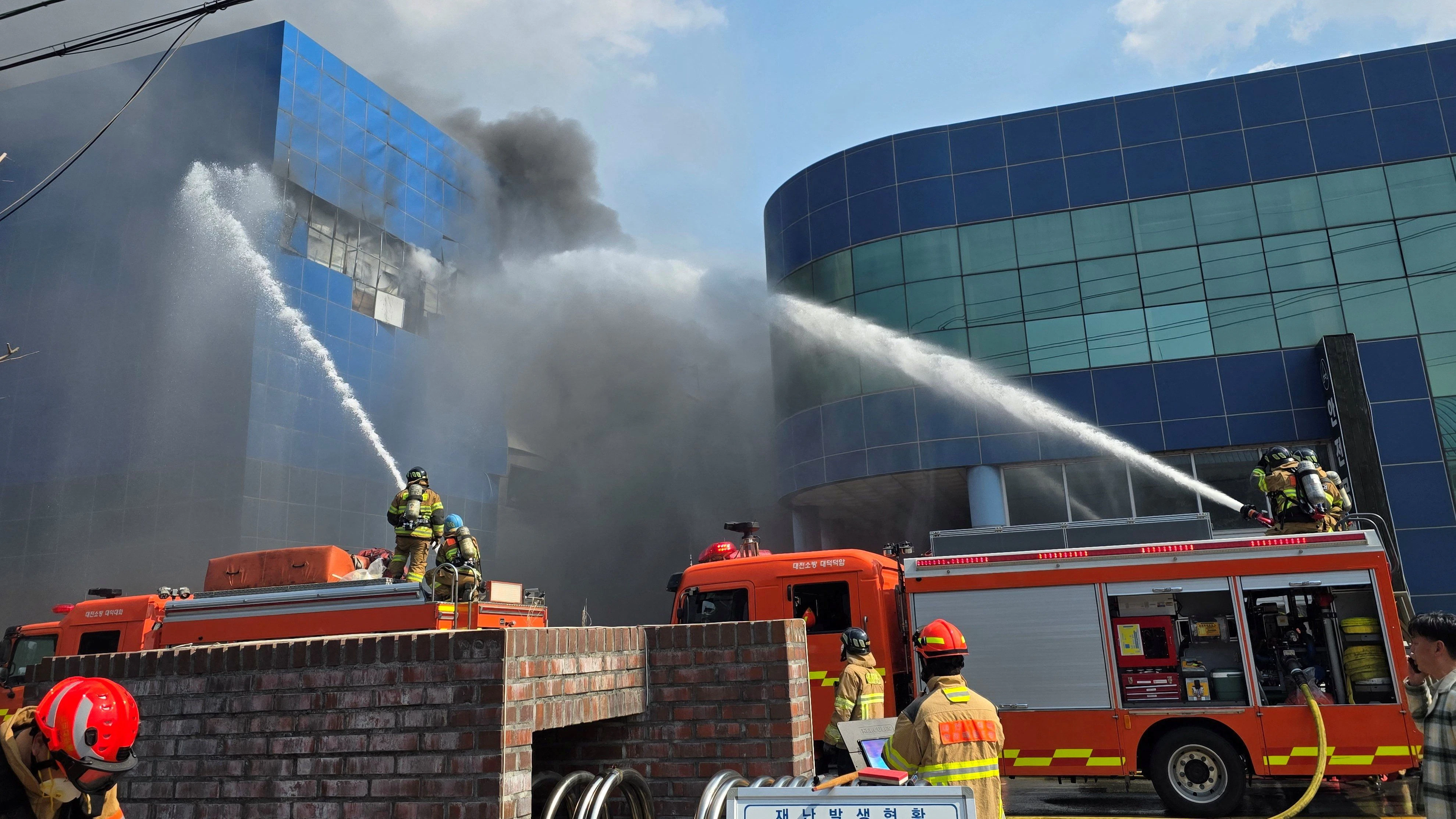Firefighters try to extinguish the fire at a car parts factory in Daejeon, South Korea, March 20, 2026.   Yonhap via REUTERS   THIS IMAGE HAS BEEN SUPPLIED BY A THIRD PARTY. NO RESALES. NO ARCHIVES. SOUTH KOREA OUT. NO COMMERCIAL OR EDITORIAL SALES IN SOUTH KOREA.
