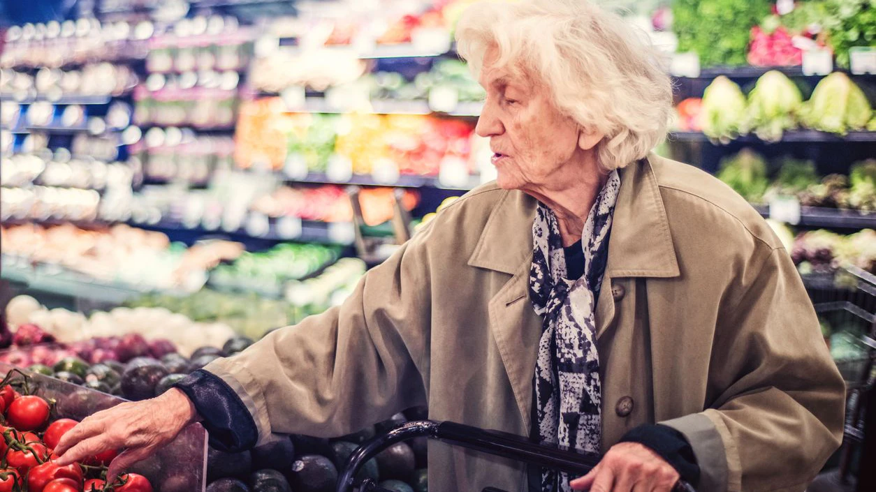 Senior Woman Shopping in Grocery Store